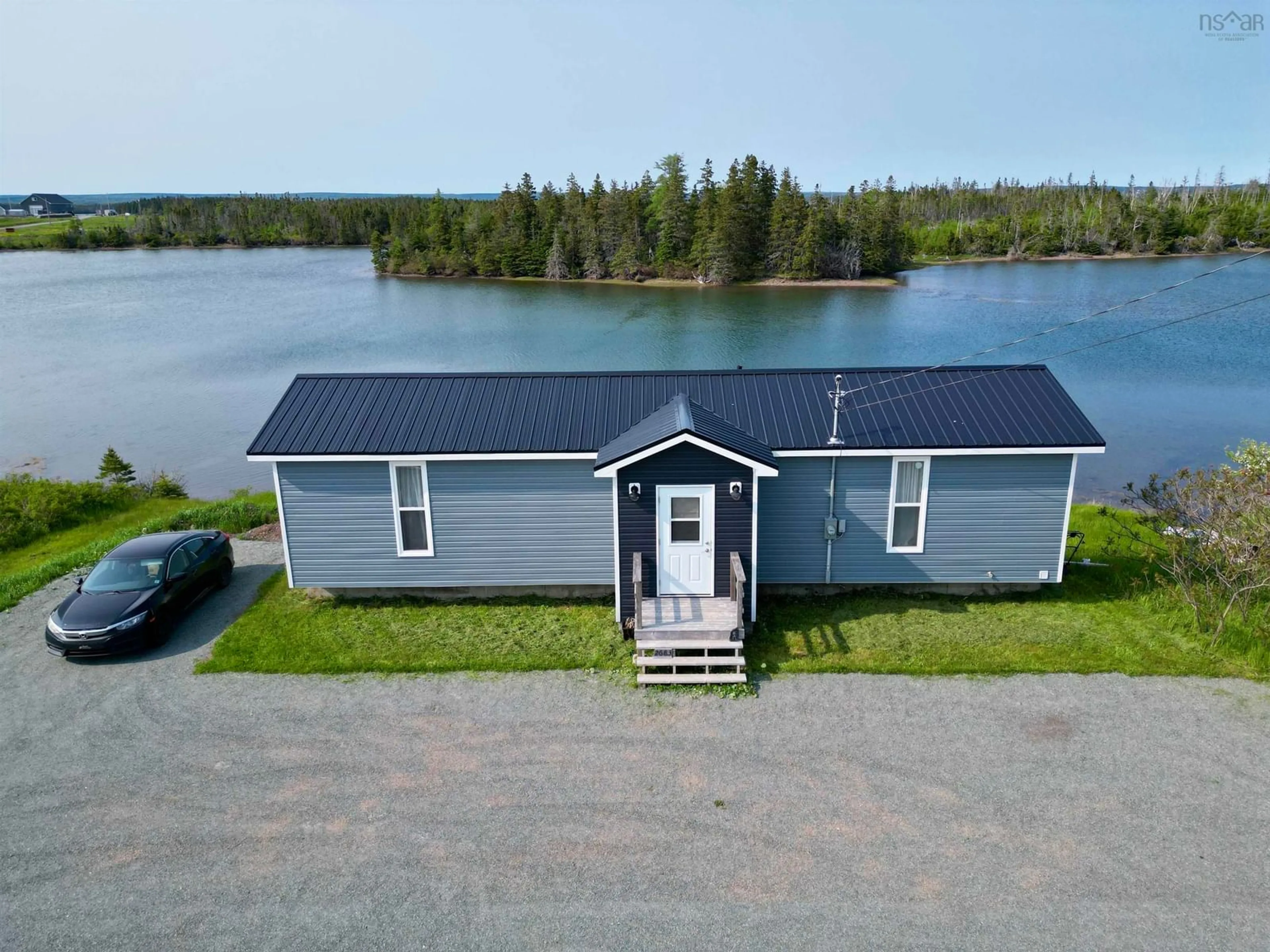 A pic from outside/outdoor area/front of a property/back of a property/a pic from drone, water/lake/river/ocean view for 2683 Highway 320, Poulamon Nova Scotia B0E 1K0
