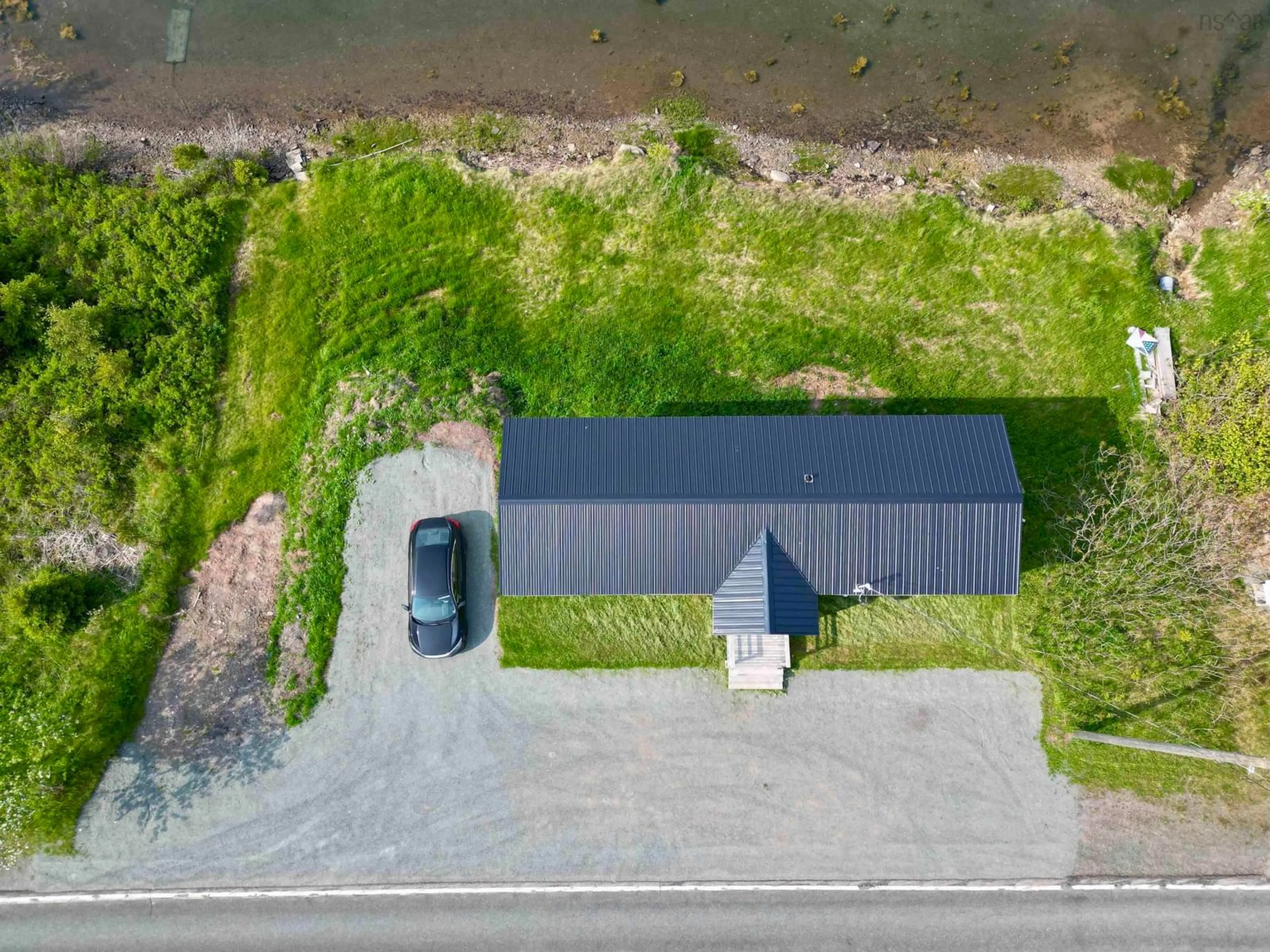A pic from outside/outdoor area/front of a property/back of a property/a pic from drone, unknown for 2683 Highway 320, Poulamon Nova Scotia B0E 1K0