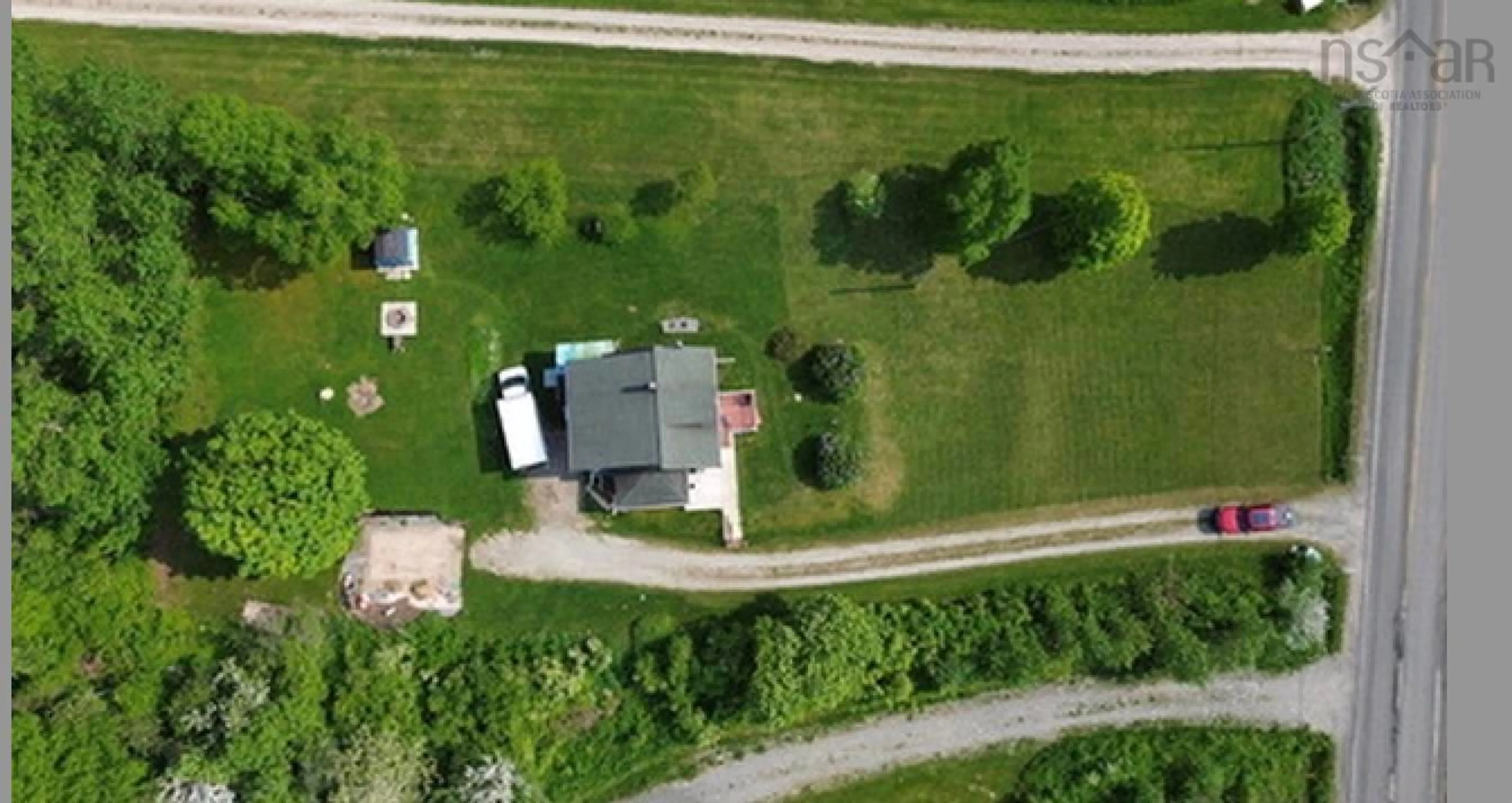 A pic from outside/outdoor area/front of a property/back of a property/a pic from drone, street for 3498 Highway 395, East Lake Ainslie Nova Scotia B0E 3M0