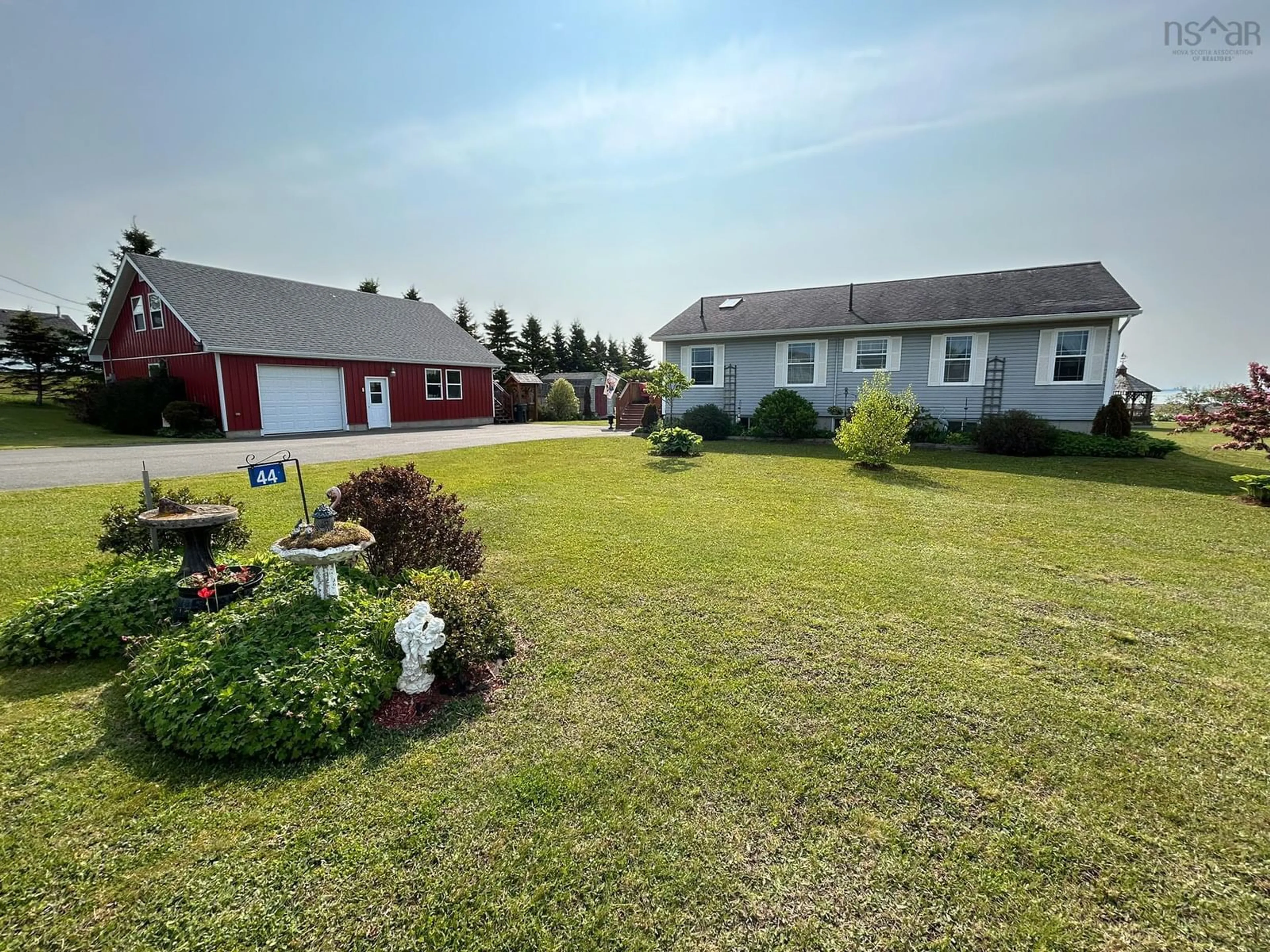 A pic from outside/outdoor area/front of a property/back of a property/a pic from drone, unknown for 44 North River Lane, Lower Five Islands Nova Scotia B0M 1N0
