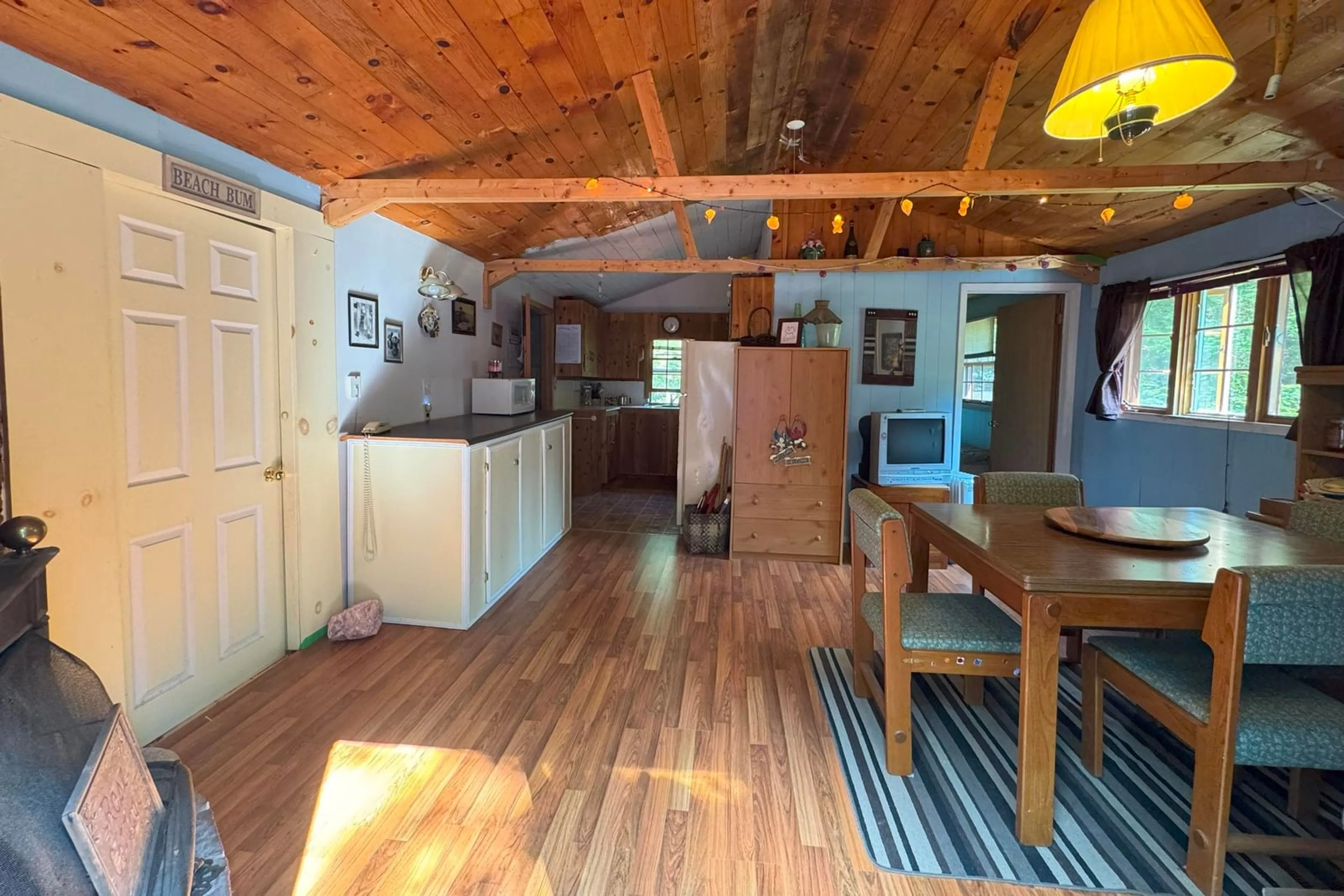 Open concept kitchen, wood/laminate floor for 19 Cove Rd, Greenhill Nova Scotia B0M 1S0