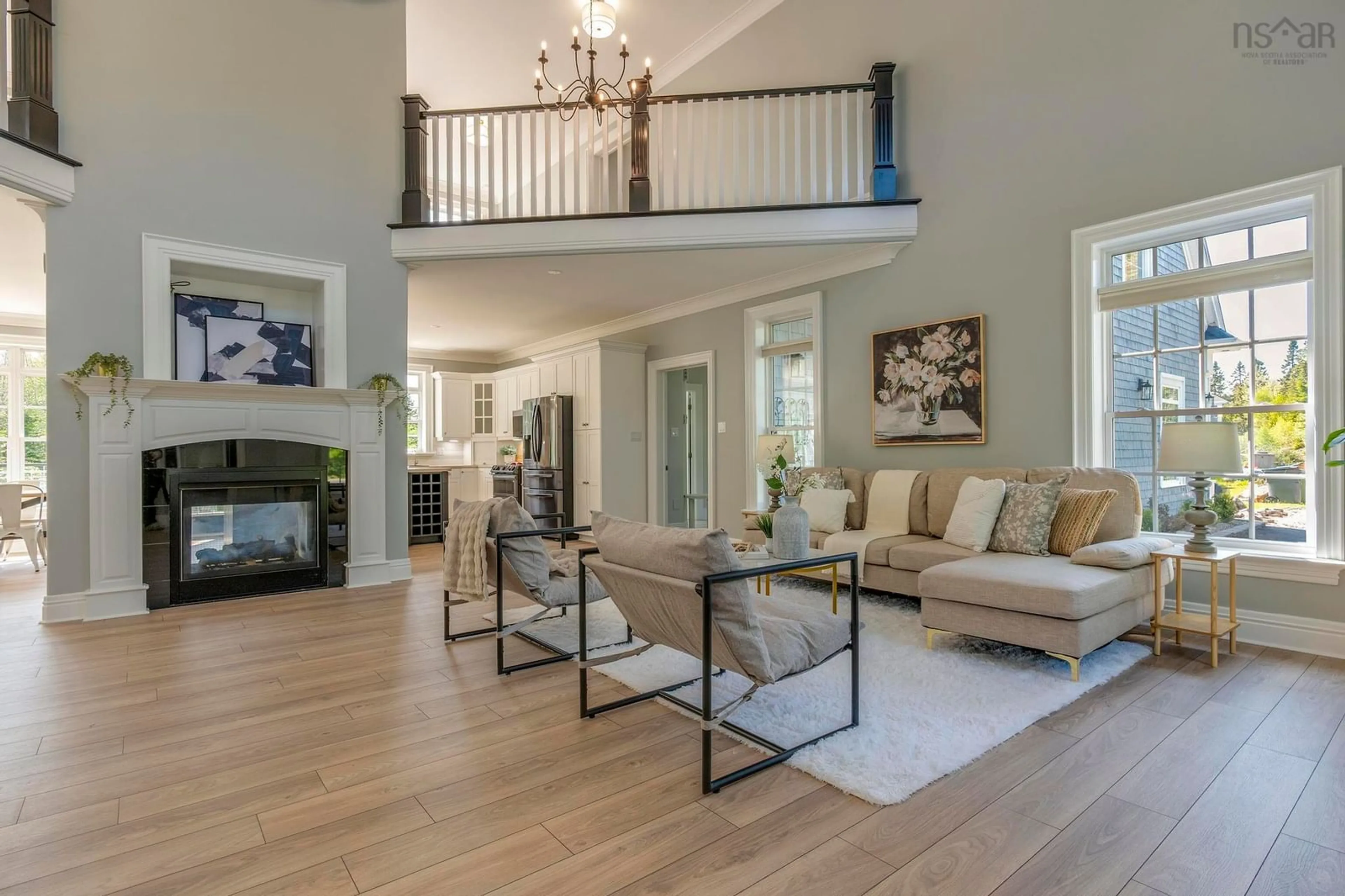 Living room with furniture, wood/laminate floor for 16 Harvest Lane, Upper Tantallon Nova Scotia B3Z 1L3