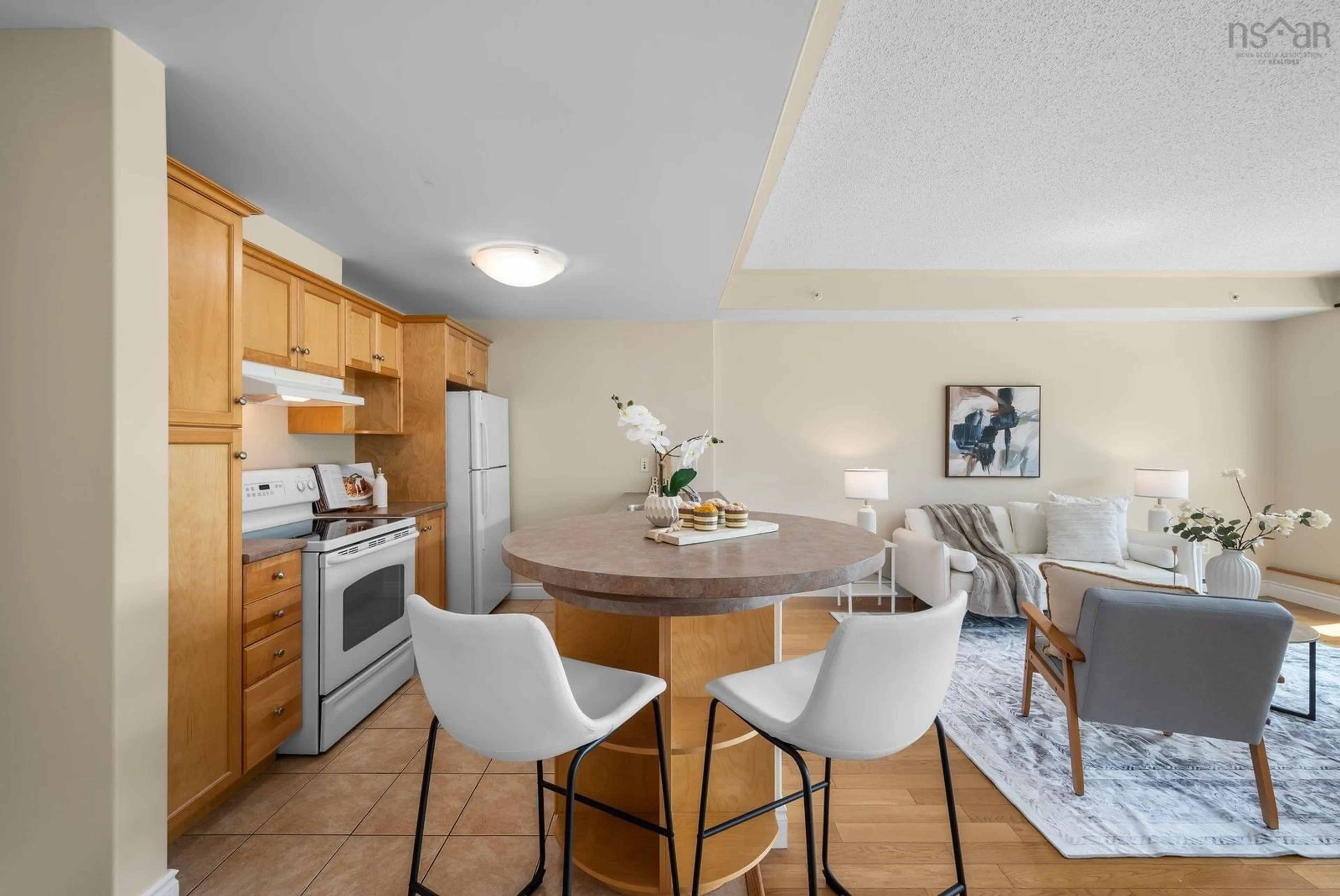 Open concept kitchen, wood/laminate floor for 647 Bedford Hwy #305, Halifax Nova Scotia B3M 0A5