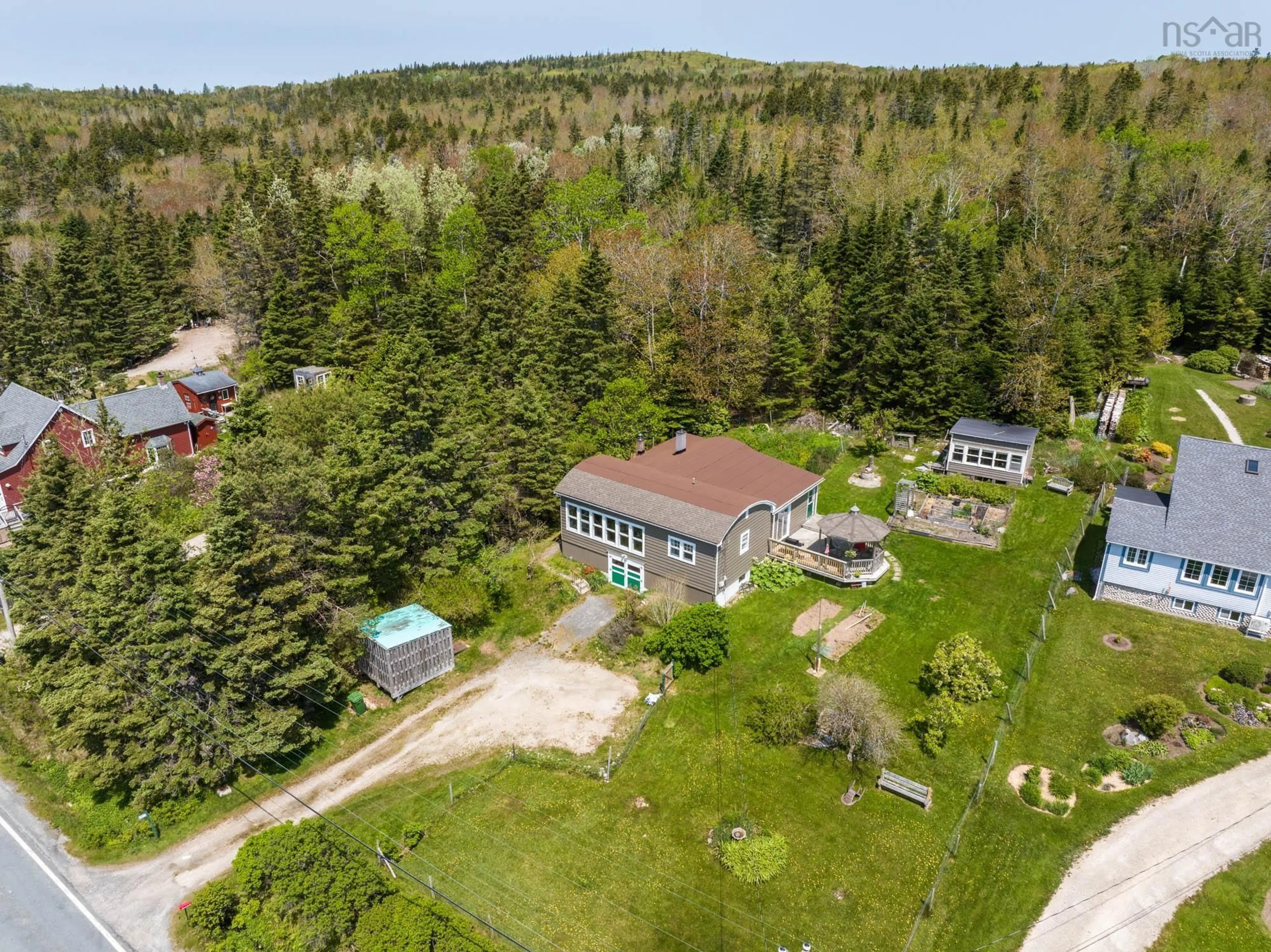 A pic from outside/outdoor area/front of a property/back of a property/a pic from drone, unknown for 9199 St Margarets Bay Rd, Queensland Nova Scotia B0J 1T0