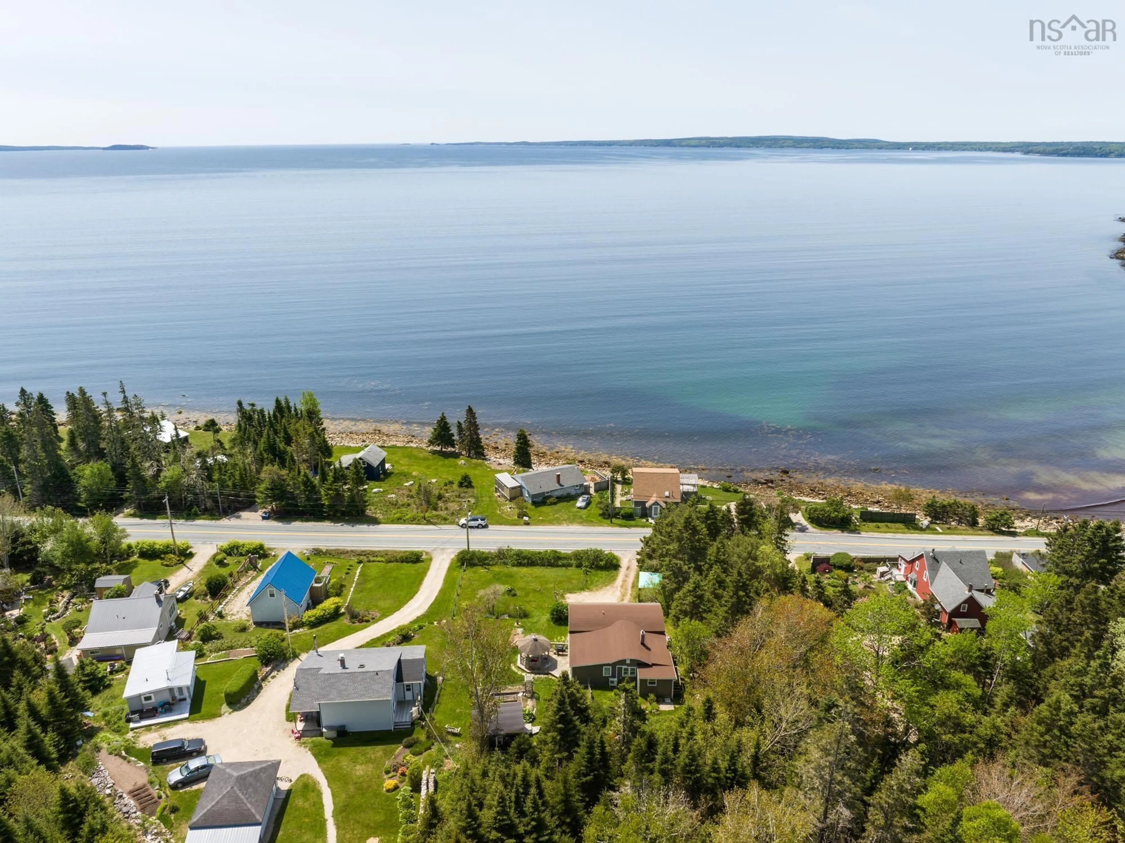 A pic from outside/outdoor area/front of a property/back of a property/a pic from drone, water/lake/river/ocean view for 9199 St Margarets Bay Rd, Queensland Nova Scotia B0J 1T0