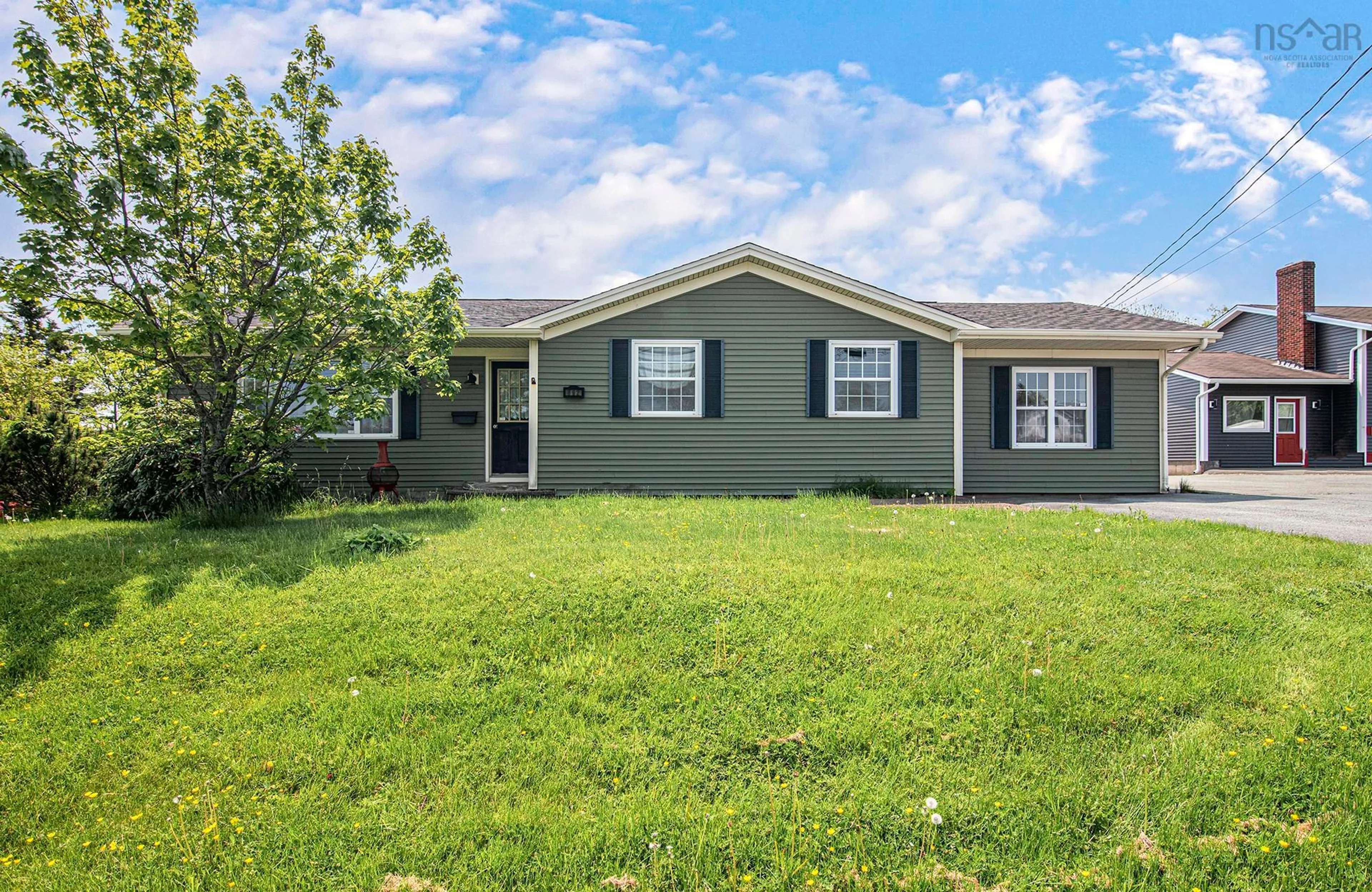 Home with vinyl exterior material, street for 892 Portland St, Dartmouth Nova Scotia B2W 2N3