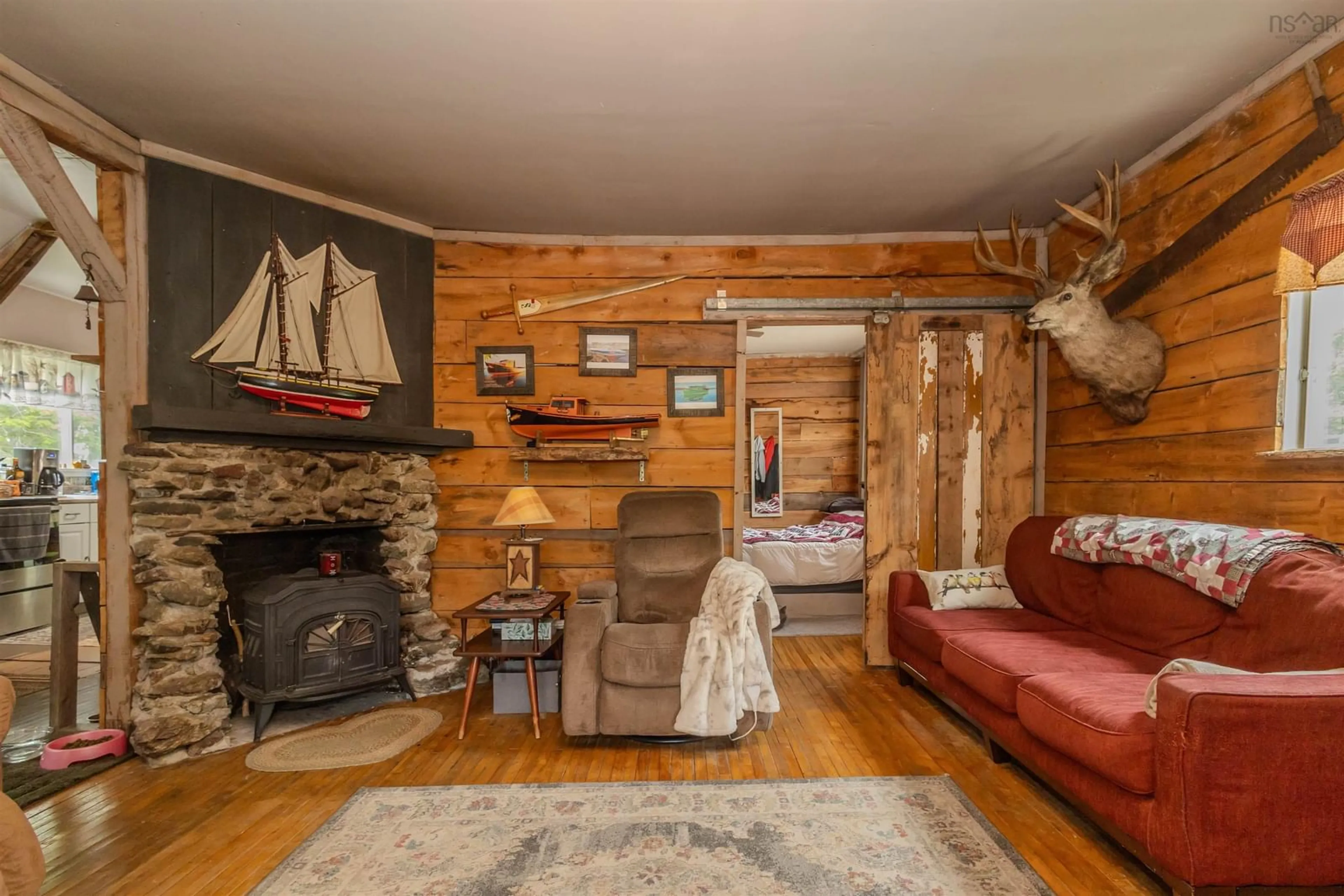 Living room with furniture, wood/laminate floor for 1651 Trout Brook Rd, Albert Bridge Nova Scotia B1K 2L2
