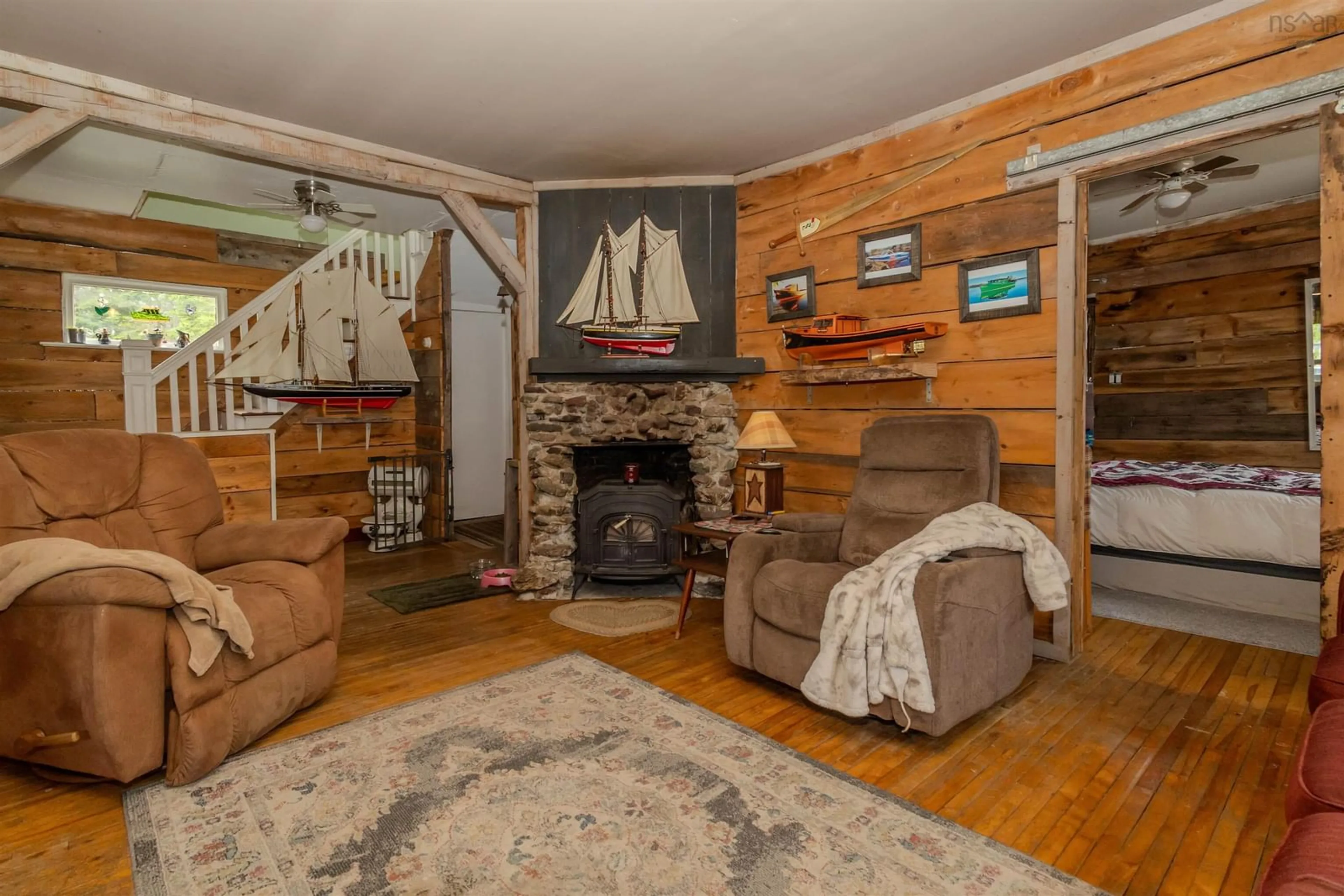 Living room with furniture, wood/laminate floor for 1651 Trout Brook Rd, Albert Bridge Nova Scotia B1K 2L2