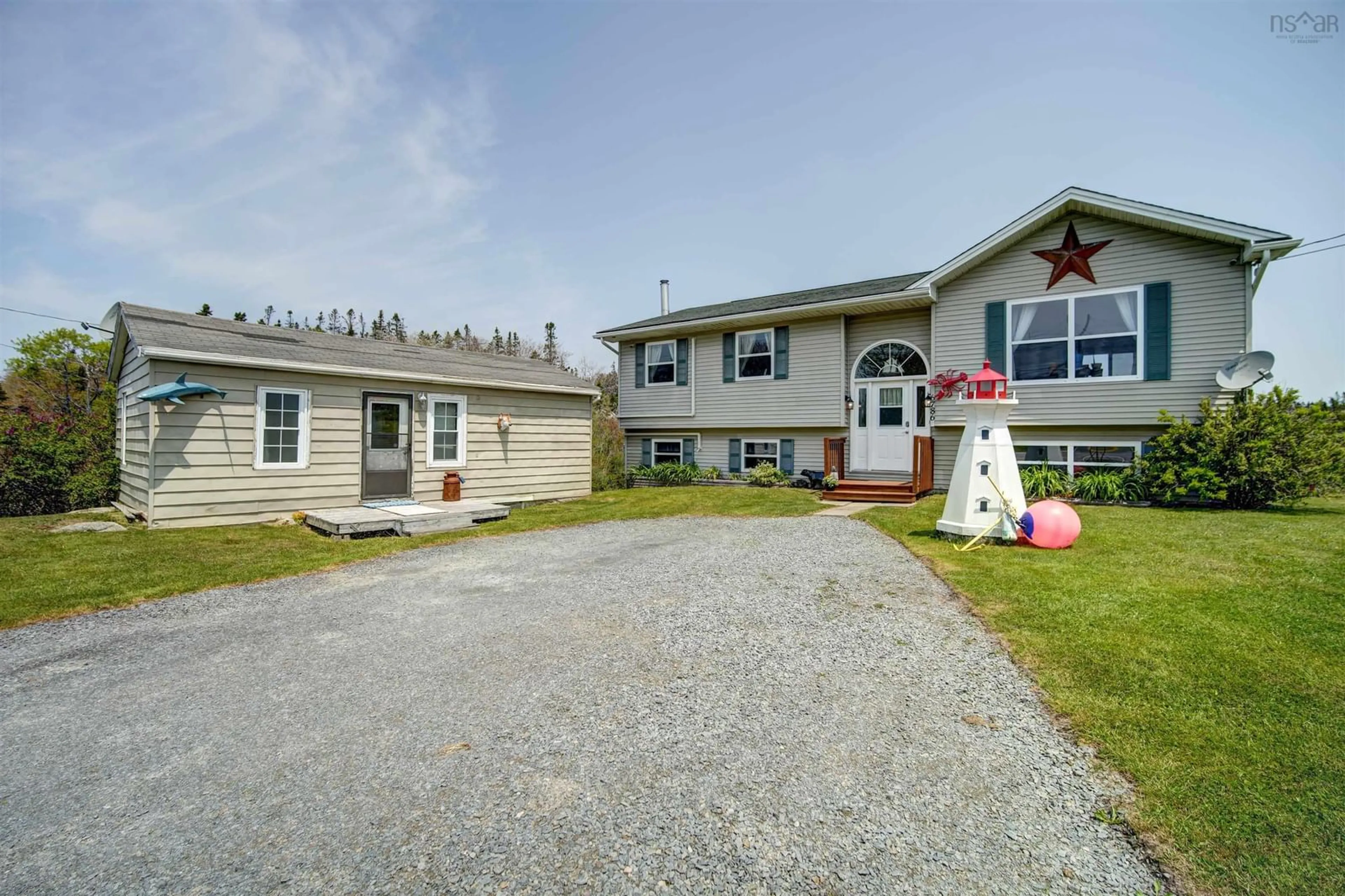 A pic from outside/outdoor area/front of a property/back of a property/a pic from drone, street for 6786 Prospect Rd, West Dover Nova Scotia B3Z 3T2