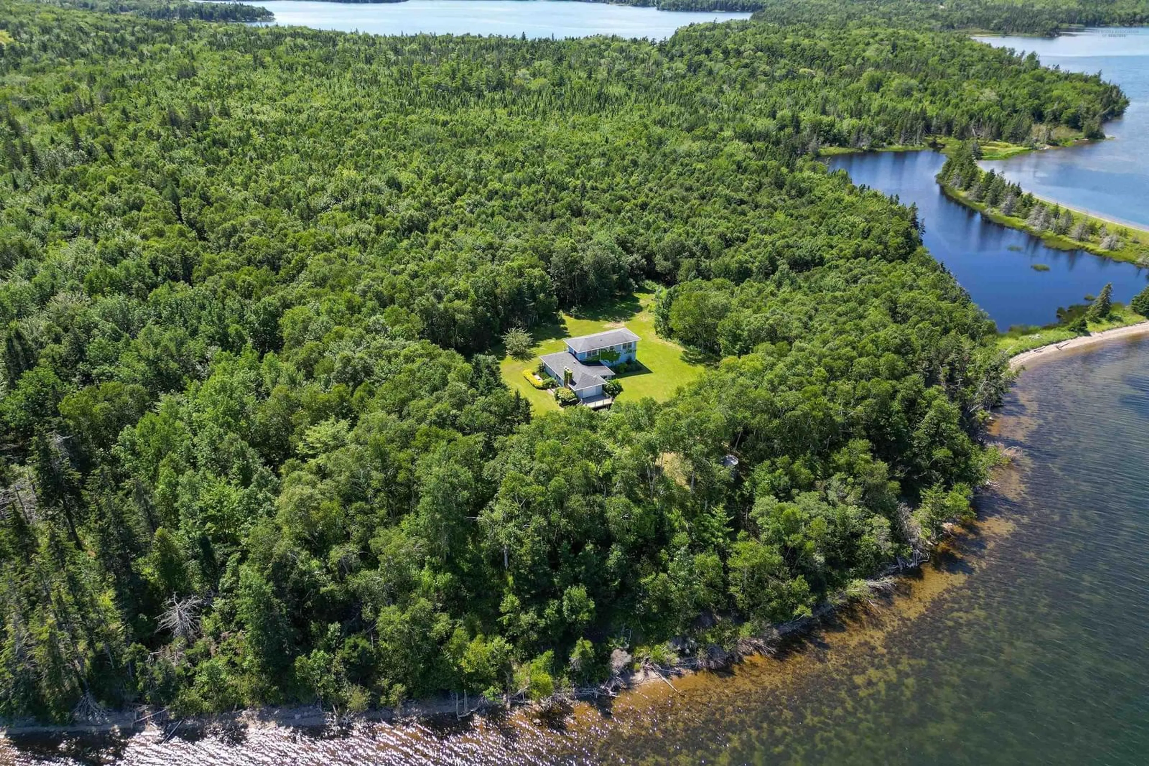 A pic from outside/outdoor area/front of a property/back of a property/a pic from drone, water/lake/river/ocean view for 305 Militia Point Rd, Militia Point Nova Scotia B0E 2Y0