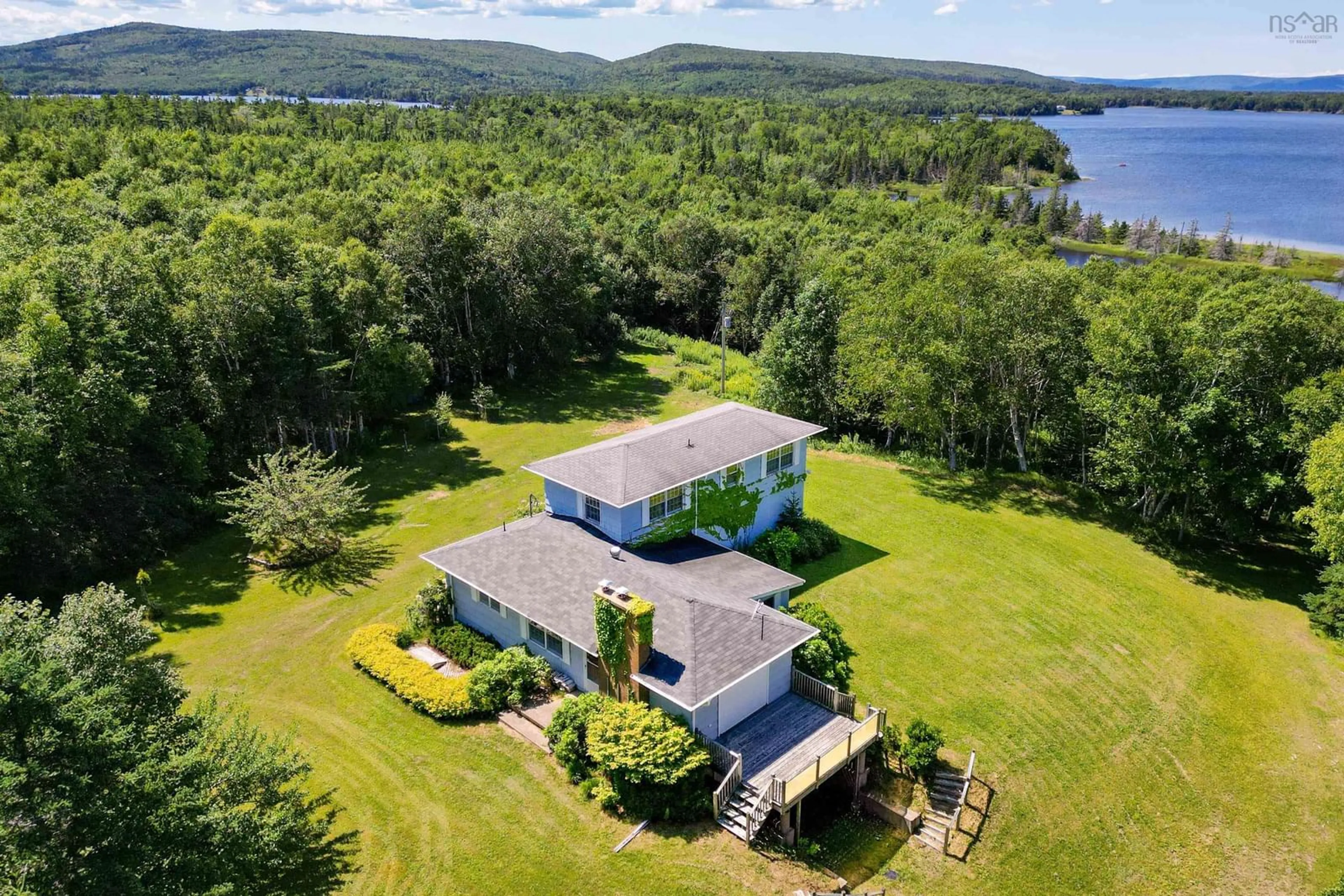 A pic from outside/outdoor area/front of a property/back of a property/a pic from drone, water/lake/river/ocean view for 305 Militia Point Rd, Militia Point Nova Scotia B0E 2Y0