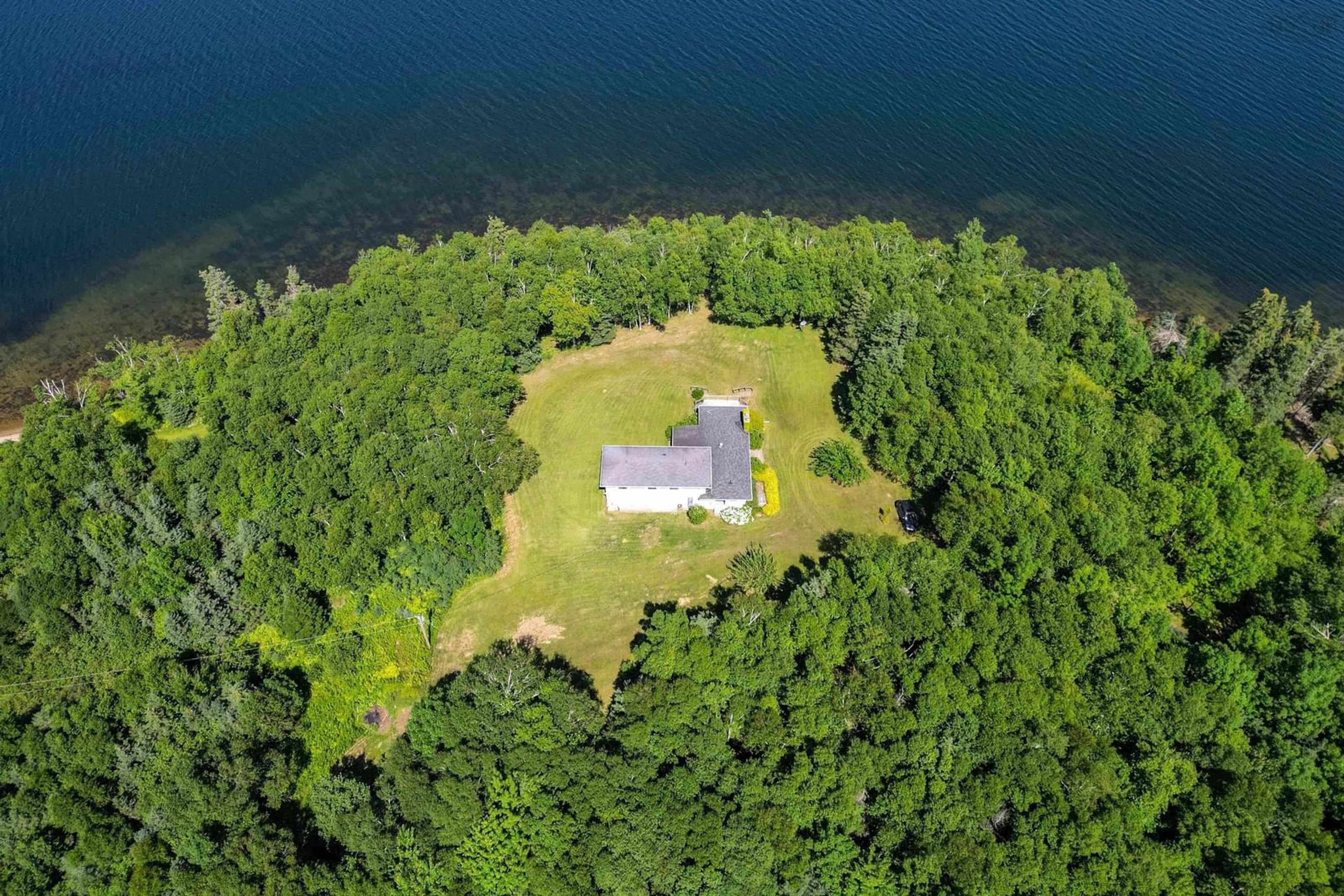 A pic from outside/outdoor area/front of a property/back of a property/a pic from drone, water/lake/river/ocean view for 305 Militia Point Rd, Militia Point Nova Scotia B0E 2Y0