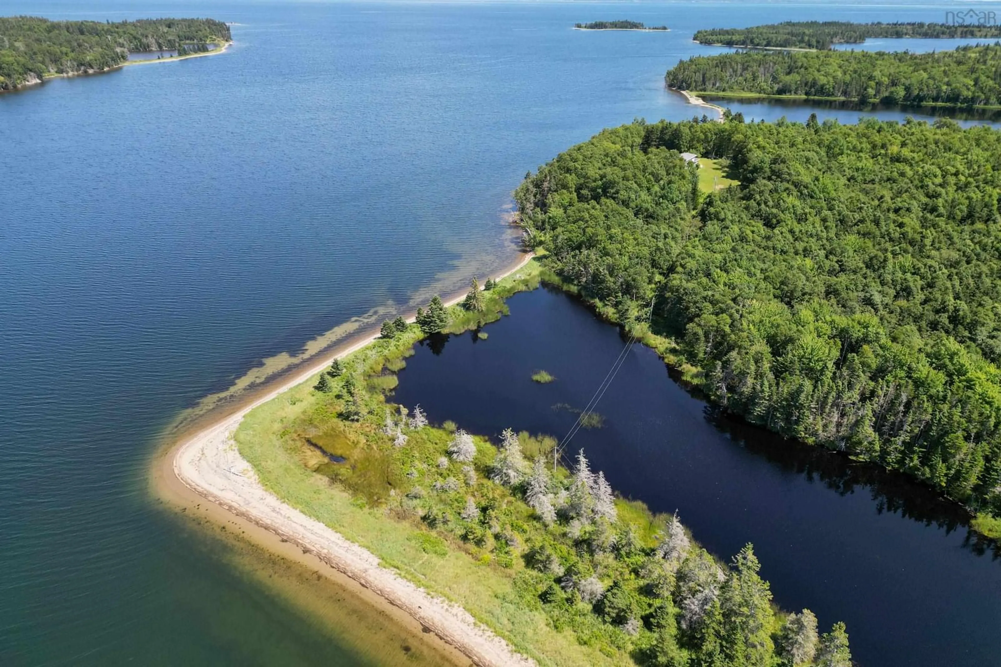 A pic from outside/outdoor area/front of a property/back of a property/a pic from drone, water/lake/river/ocean view for 305 Militia Point Rd, Militia Point Nova Scotia B0E 2Y0