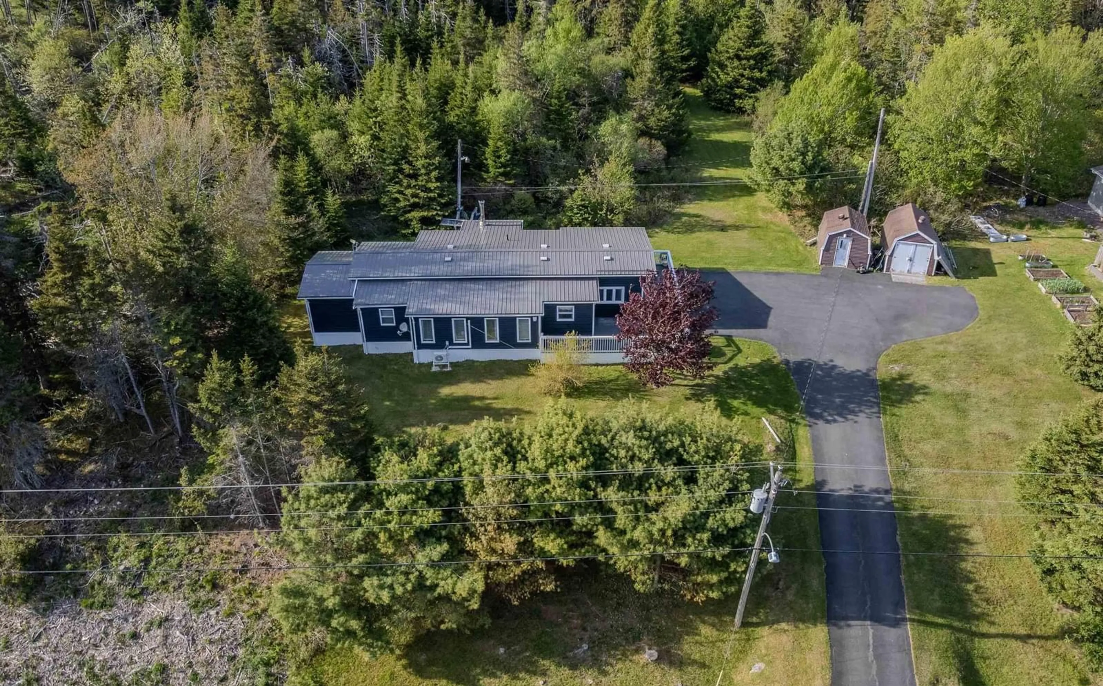 A pic from outside/outdoor area/front of a property/back of a property/a pic from drone, unknown for 35 Rocky Bay Rd, Pondville Nova Scotia B0E 1K0