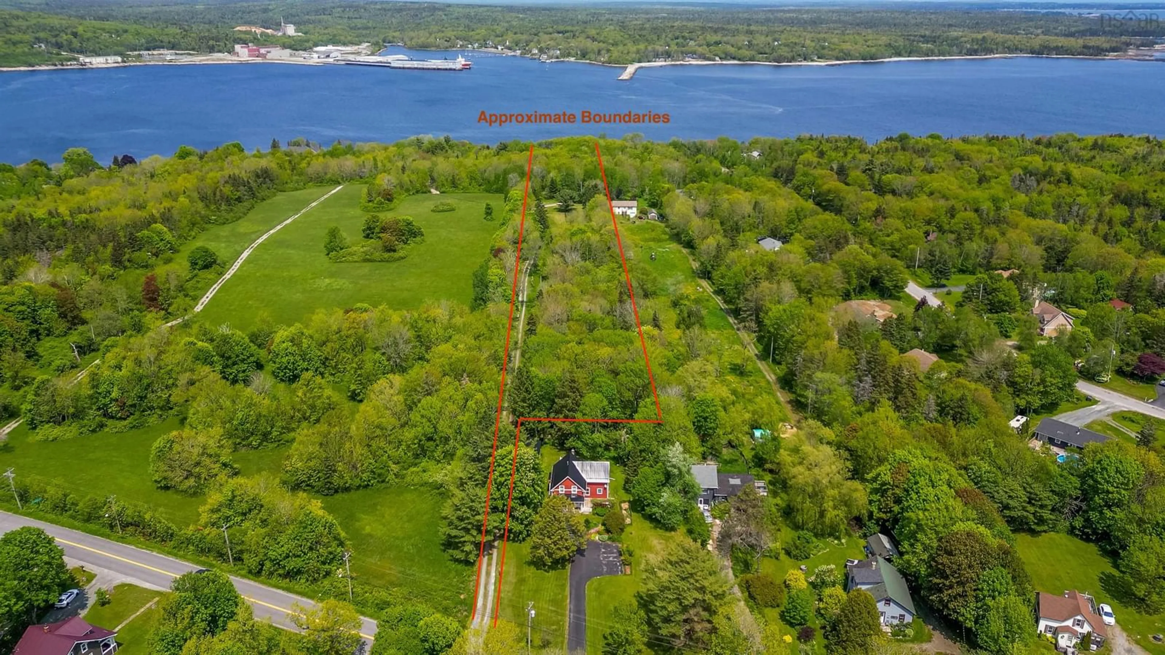 A pic from outside/outdoor area/front of a property/back of a property/a pic from drone, water/lake/river/ocean view for 65 Shore Rd, Mount Pleasant Nova Scotia B0T 1K0