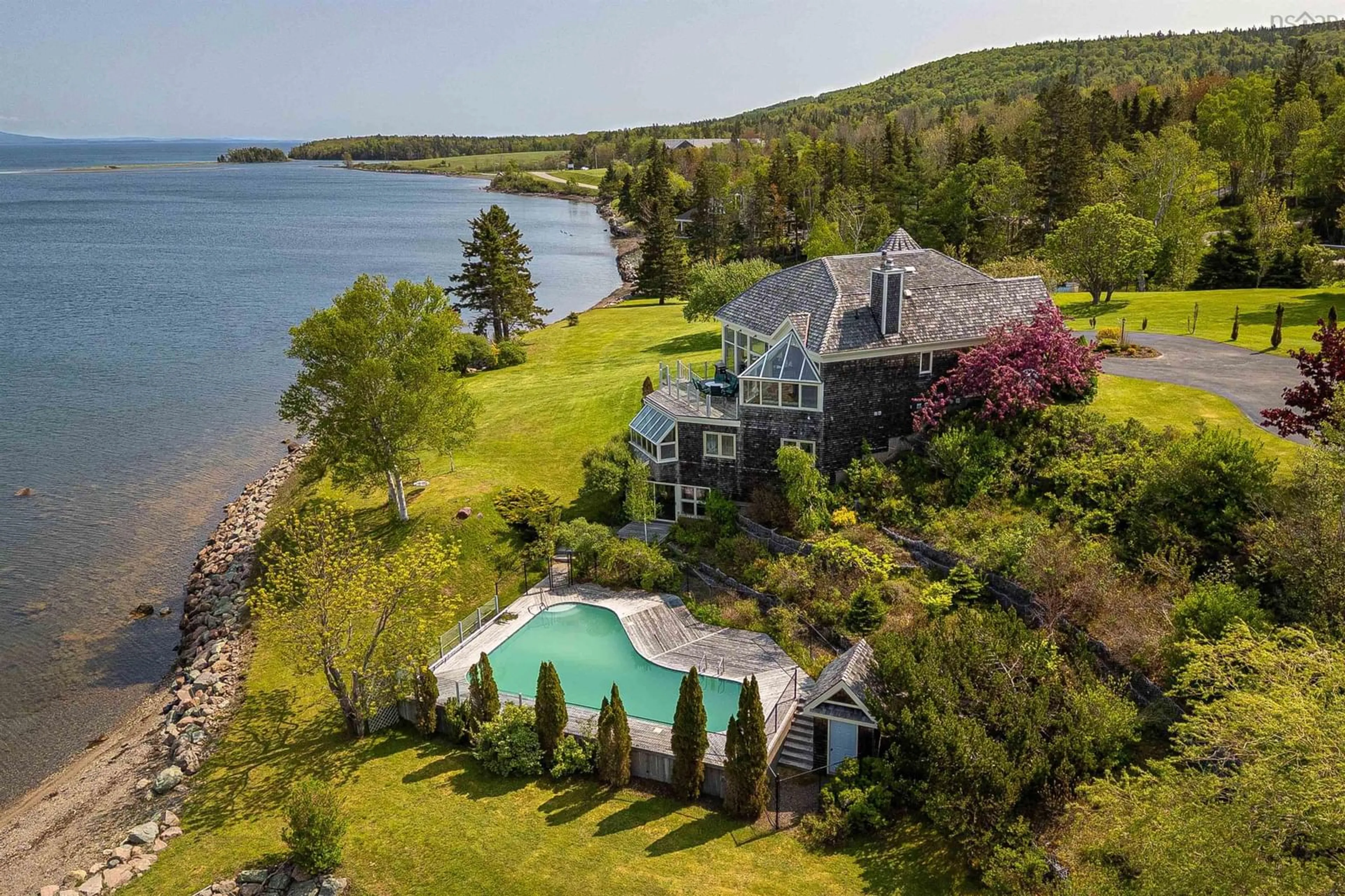 A pic from outside/outdoor area/front of a property/back of a property/a pic from drone, water/lake/river/ocean view for 2641 West Bay Rd, Dundee Nova Scotia B0E 3K0