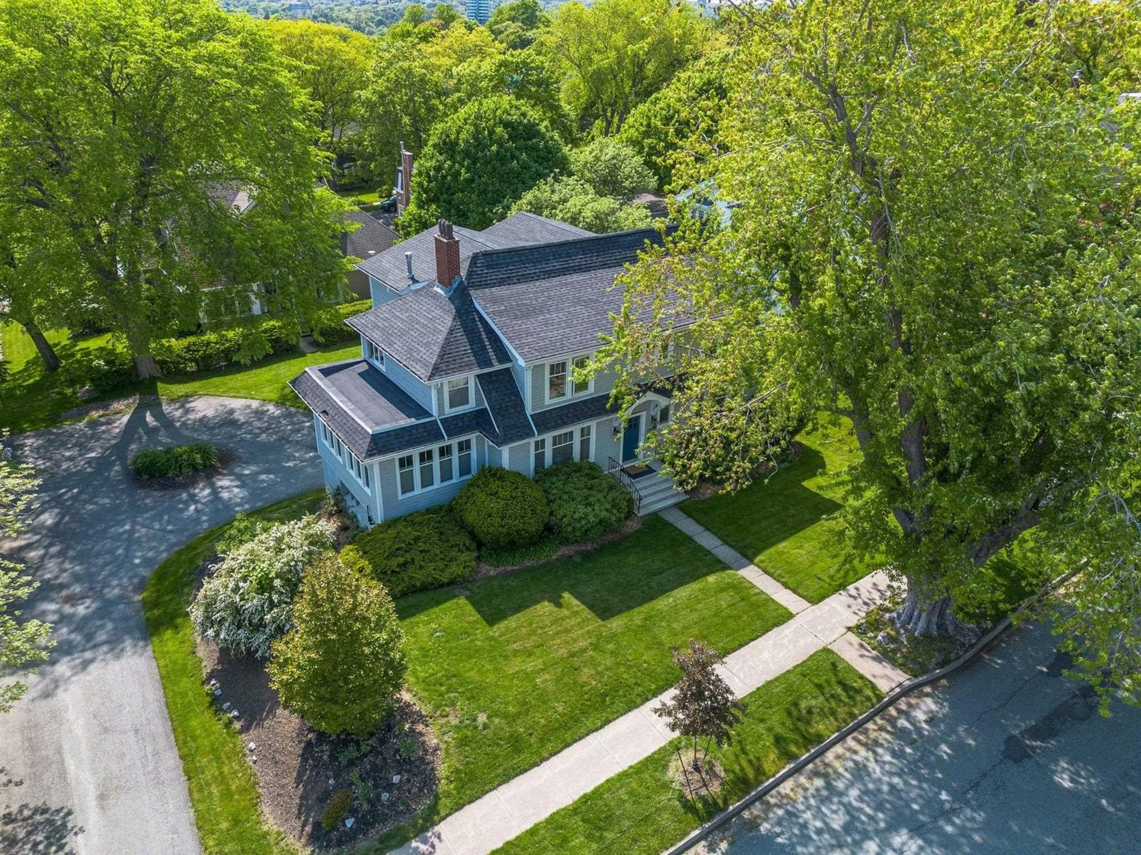 A pic from outside/outdoor area/front of a property/back of a property/a pic from drone, street for 1910 Bloomingdale Terr, Halifax Nova Scotia B3H 4E5