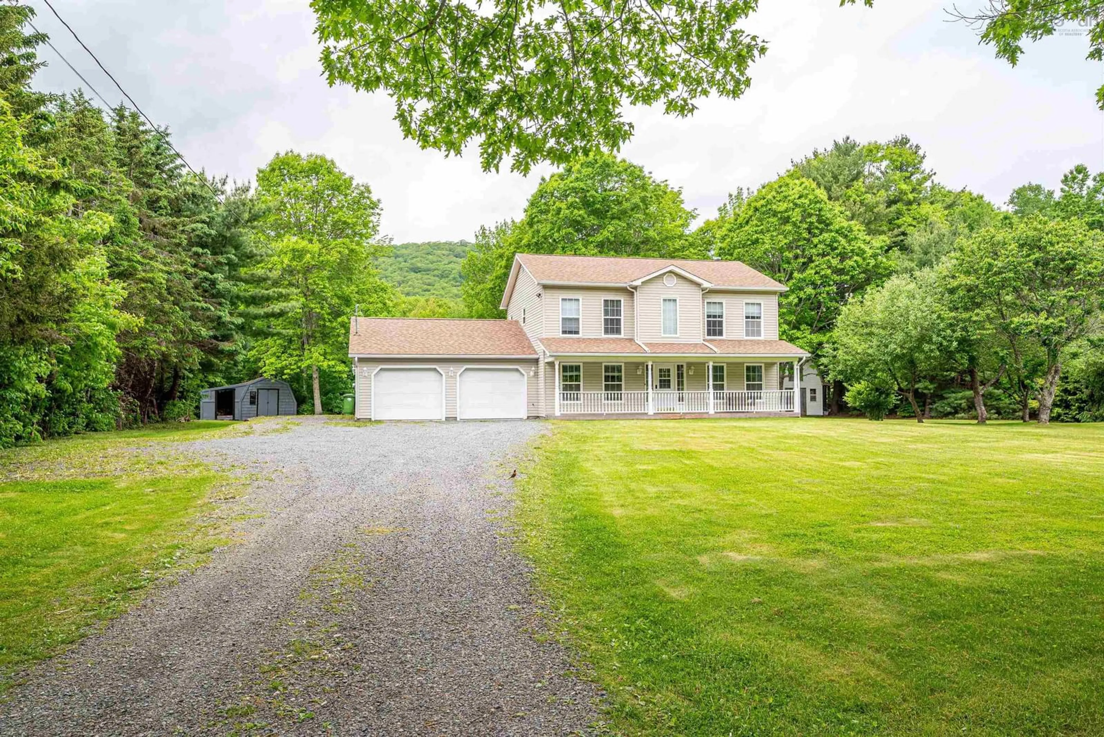 A pic from outside/outdoor area/front of a property/back of a property/a pic from drone, mountain view for 3123 Highway 14, Mill Section Nova Scotia B0N 2T0