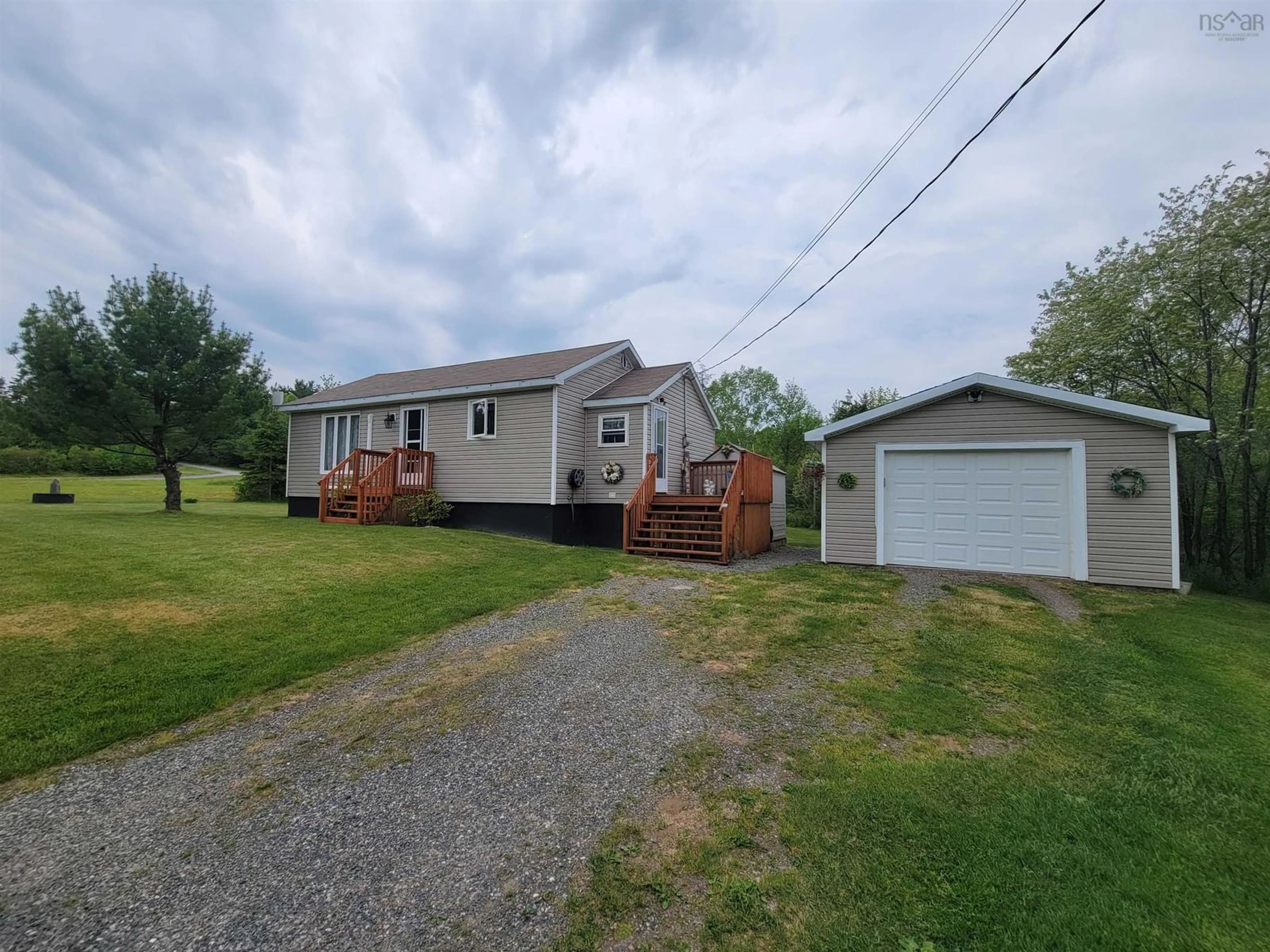 A pic from outside/outdoor area/front of a property/back of a property/a pic from drone, street for 3518 Grand Mira North Rd, Sandfield Nova Scotia B1K 1W9