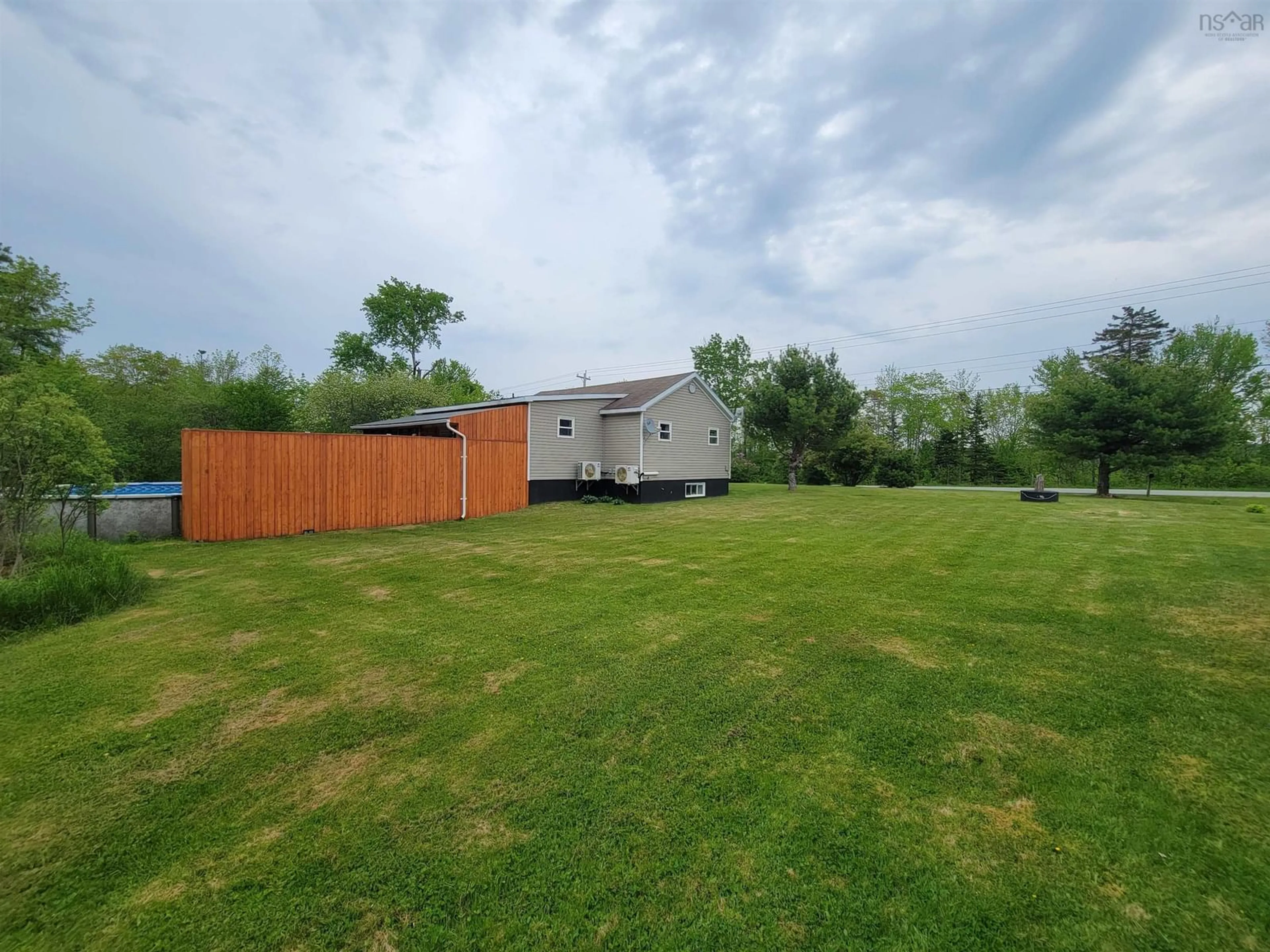 A pic from outside/outdoor area/front of a property/back of a property/a pic from drone, unknown for 3518 Grand Mira North Rd, Sandfield Nova Scotia B1K 1W9