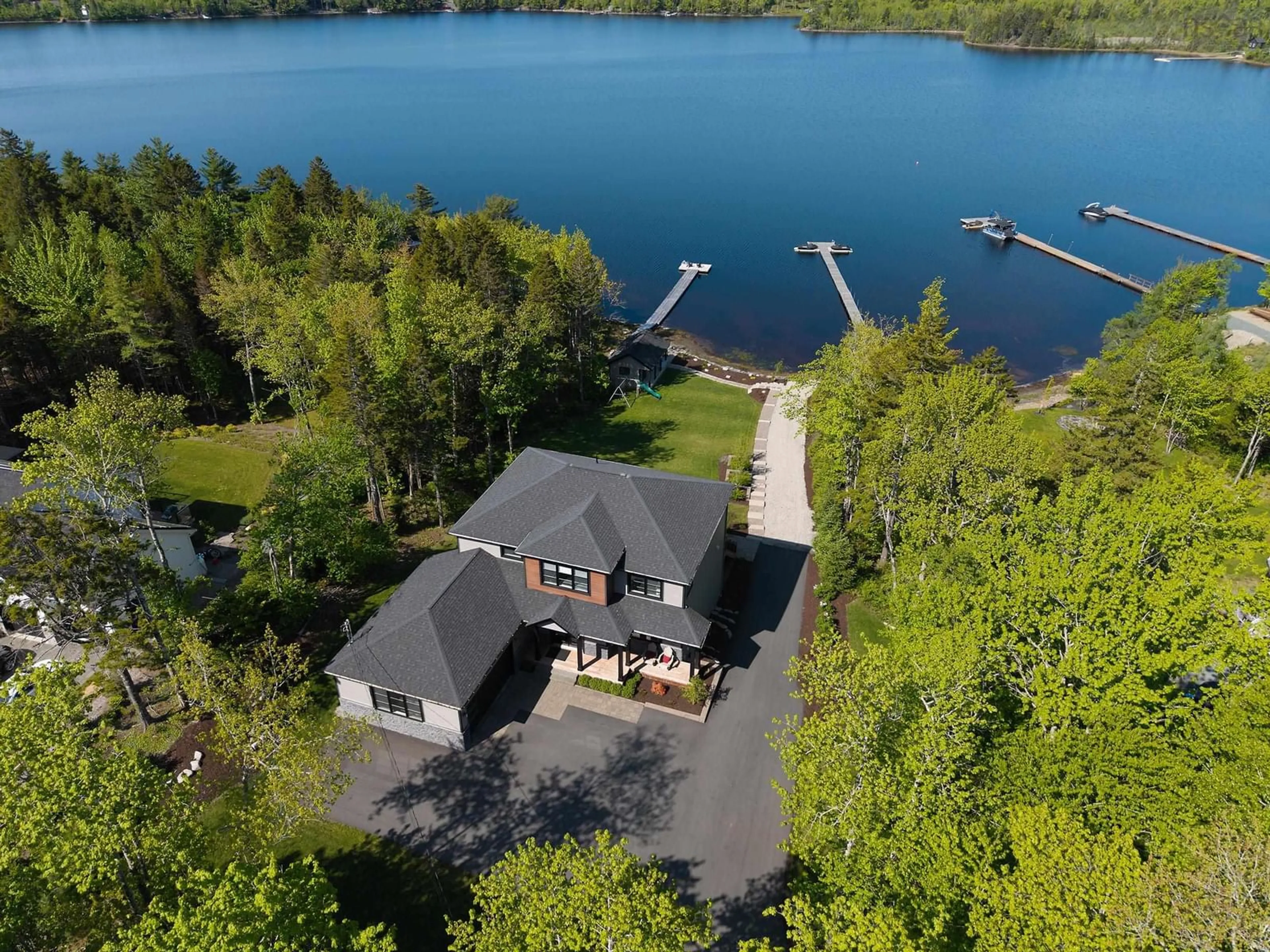 A pic from outside/outdoor area/front of a property/back of a property/a pic from drone, water/lake/river/ocean view for 692 Mccabe Lake Dr, Middle Sackville Nova Scotia B4E 0N6