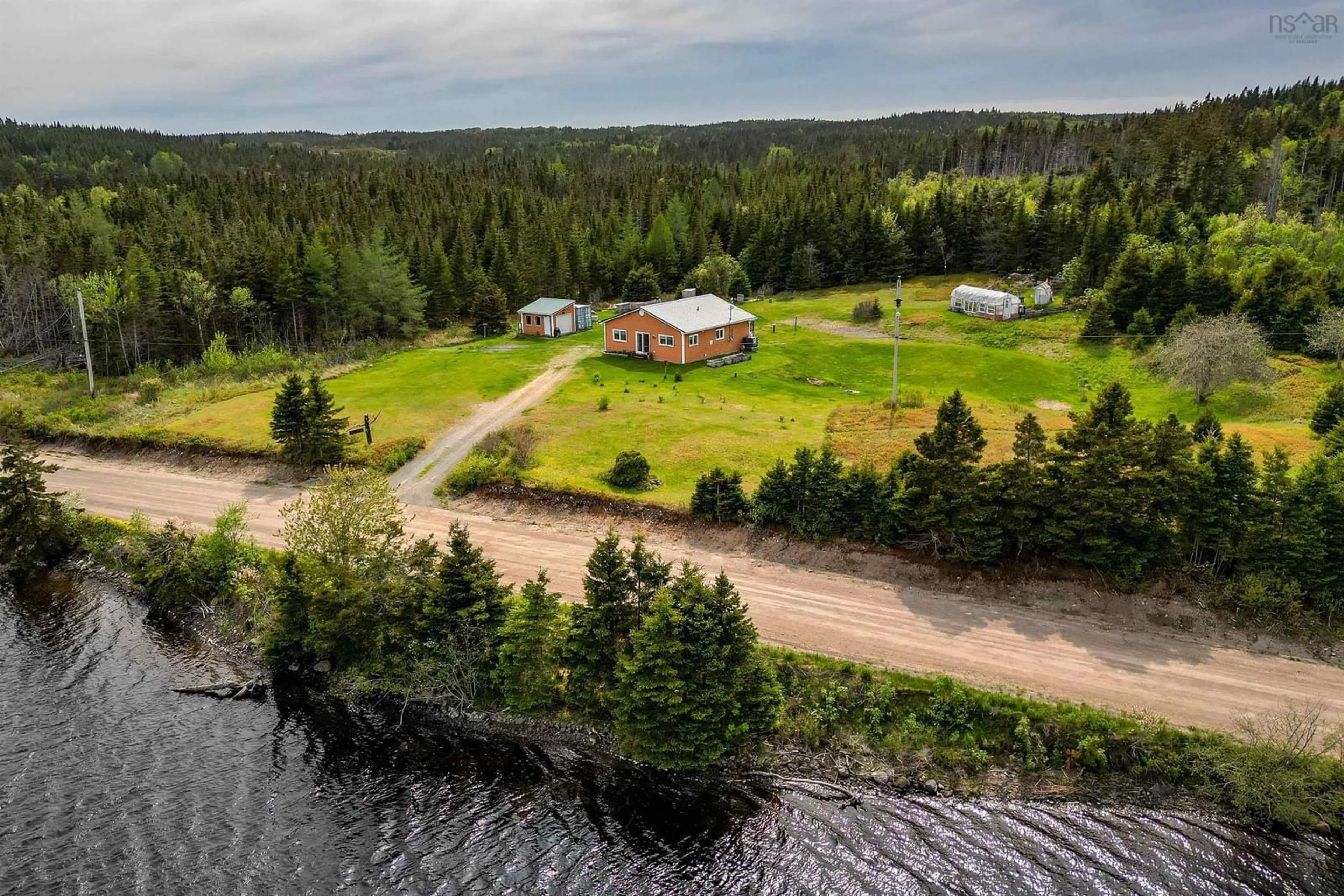 A pic from outside/outdoor area/front of a property/back of a property/a pic from drone, water/lake/river/ocean view for 60 West Side Grand River Rd, Grand River Nova Scotia B0E 1M0