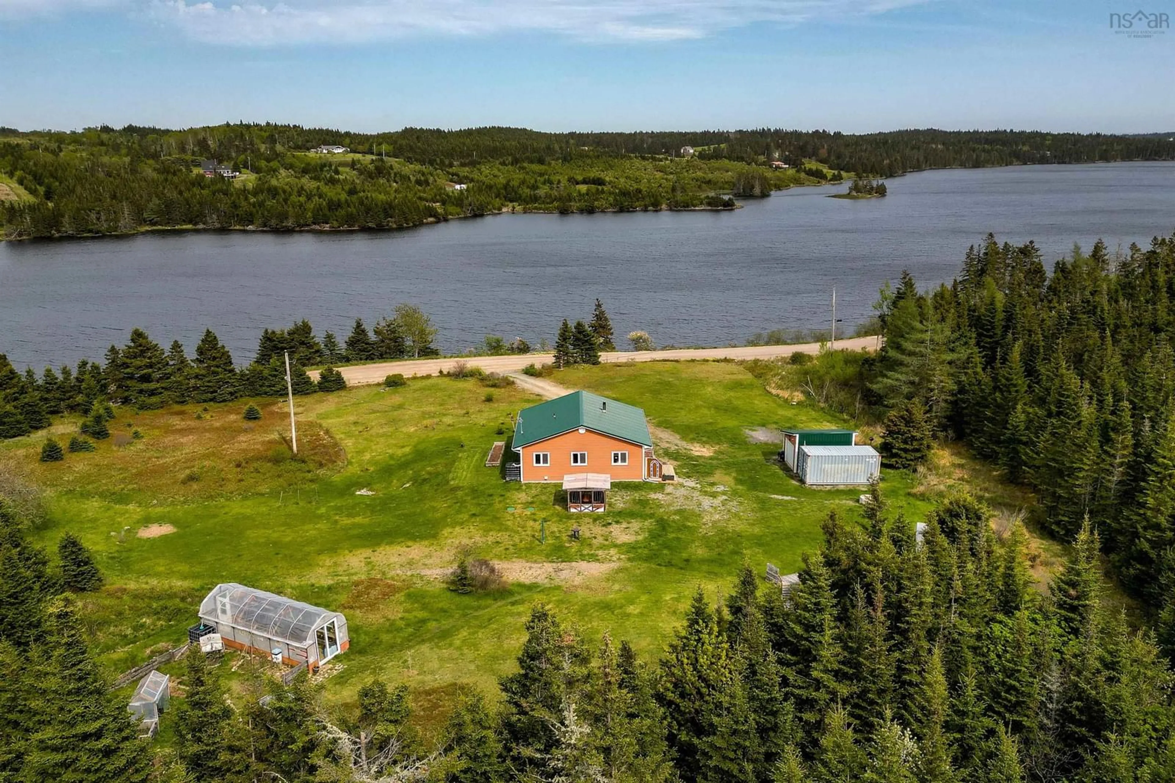 A pic from outside/outdoor area/front of a property/back of a property/a pic from drone, water/lake/river/ocean view for 60 West Side Grand River Rd, Grand River Nova Scotia B0E 1M0