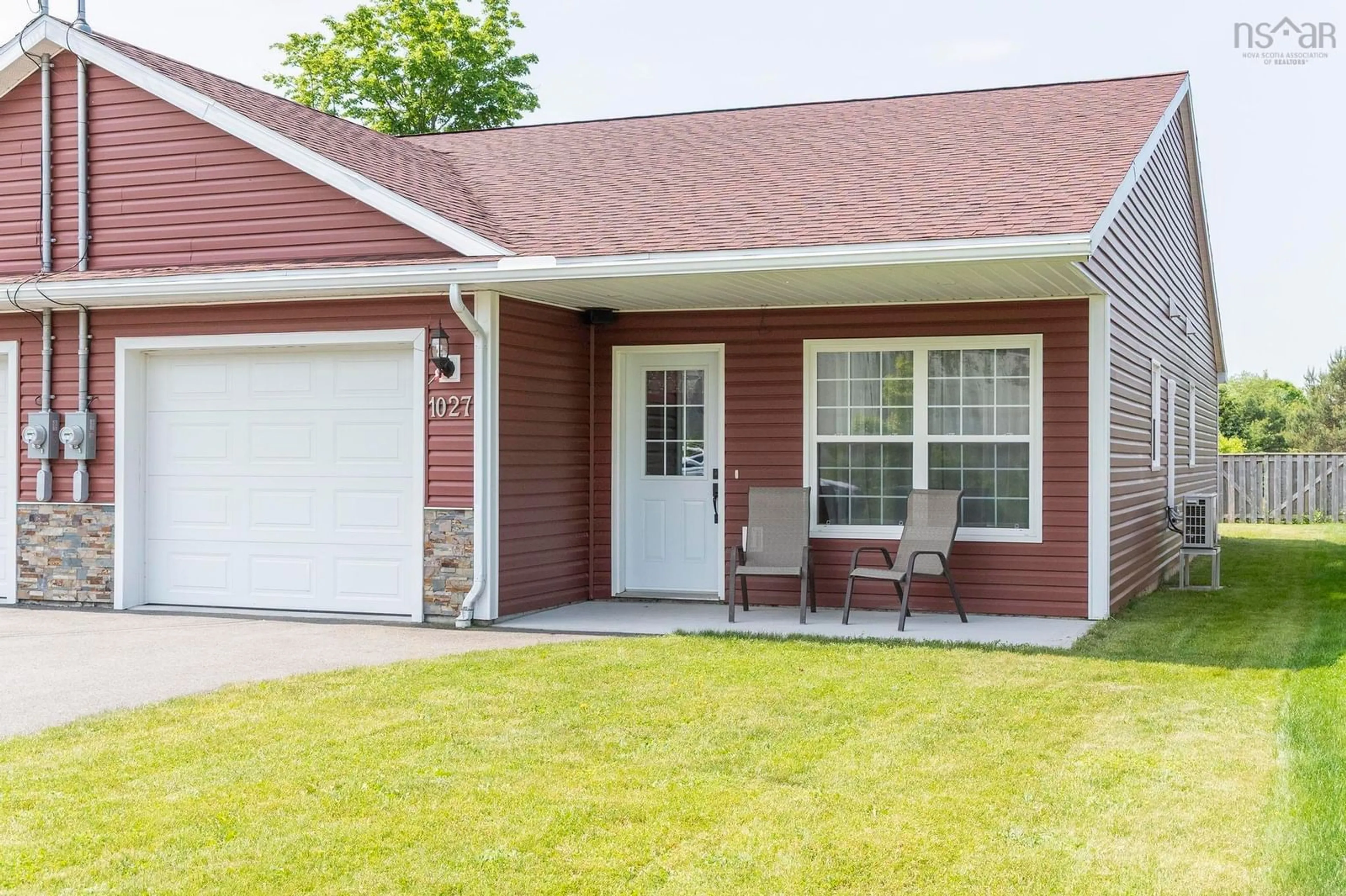 Home with vinyl exterior material, street for 1025/1027 Whittington Dr, Greenwood Nova Scotia B0P 1R0