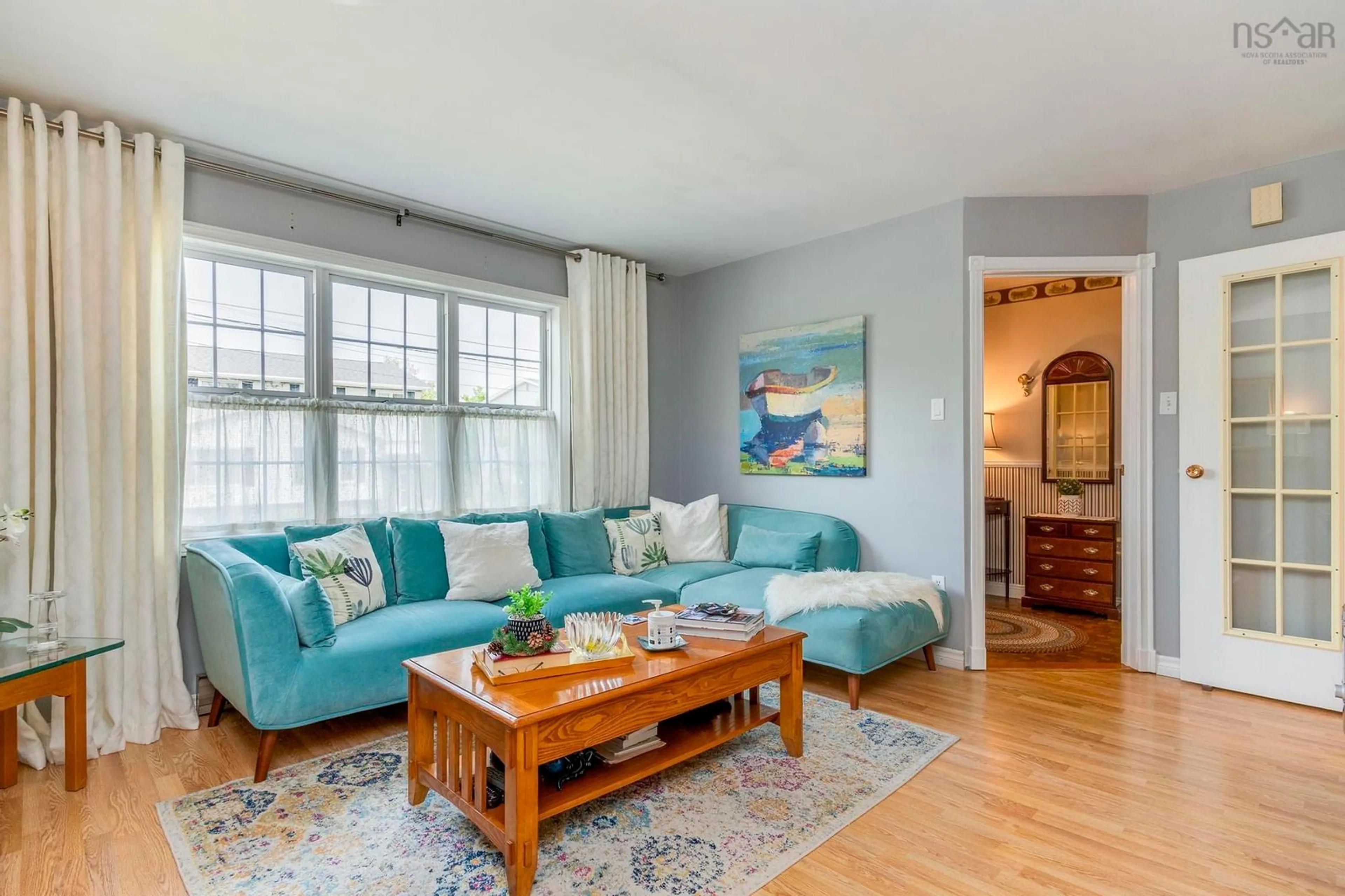 Living room with furniture, wood/laminate floor for 32 Oakwood Crt, Dartmouth Nova Scotia B2W 5P9