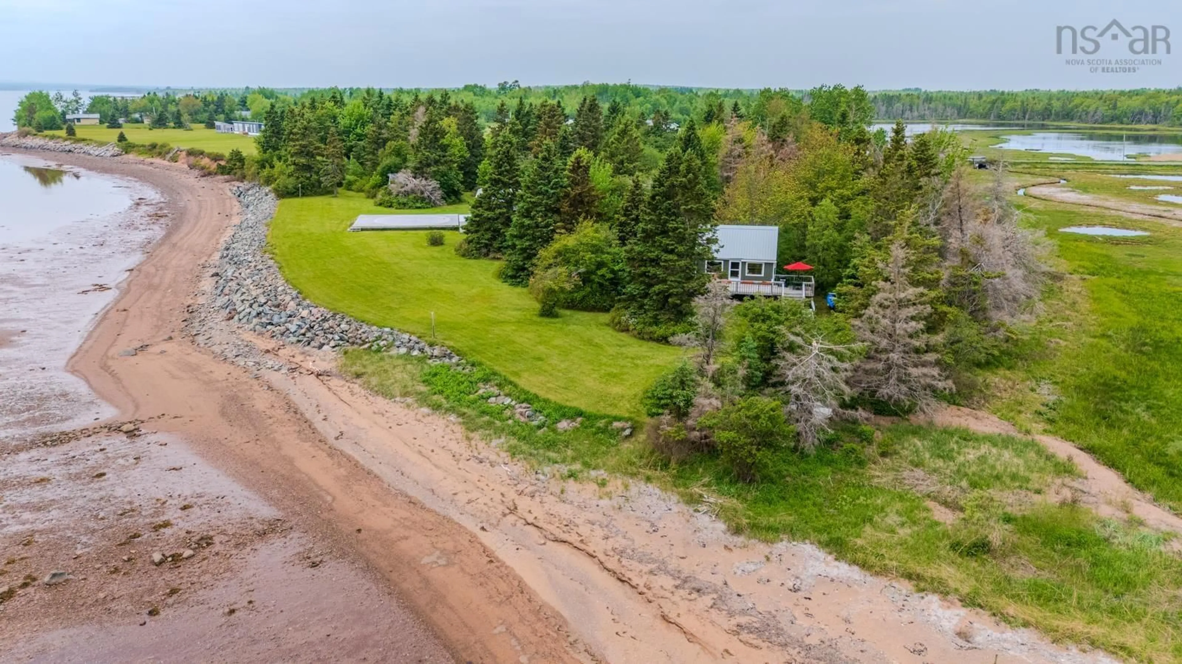 A pic from outside/outdoor area/front of a property/back of a property/a pic from drone, water/lake/river/ocean view for 4016 Malagash Rd, Malagash Point Nova Scotia B0K 1E0