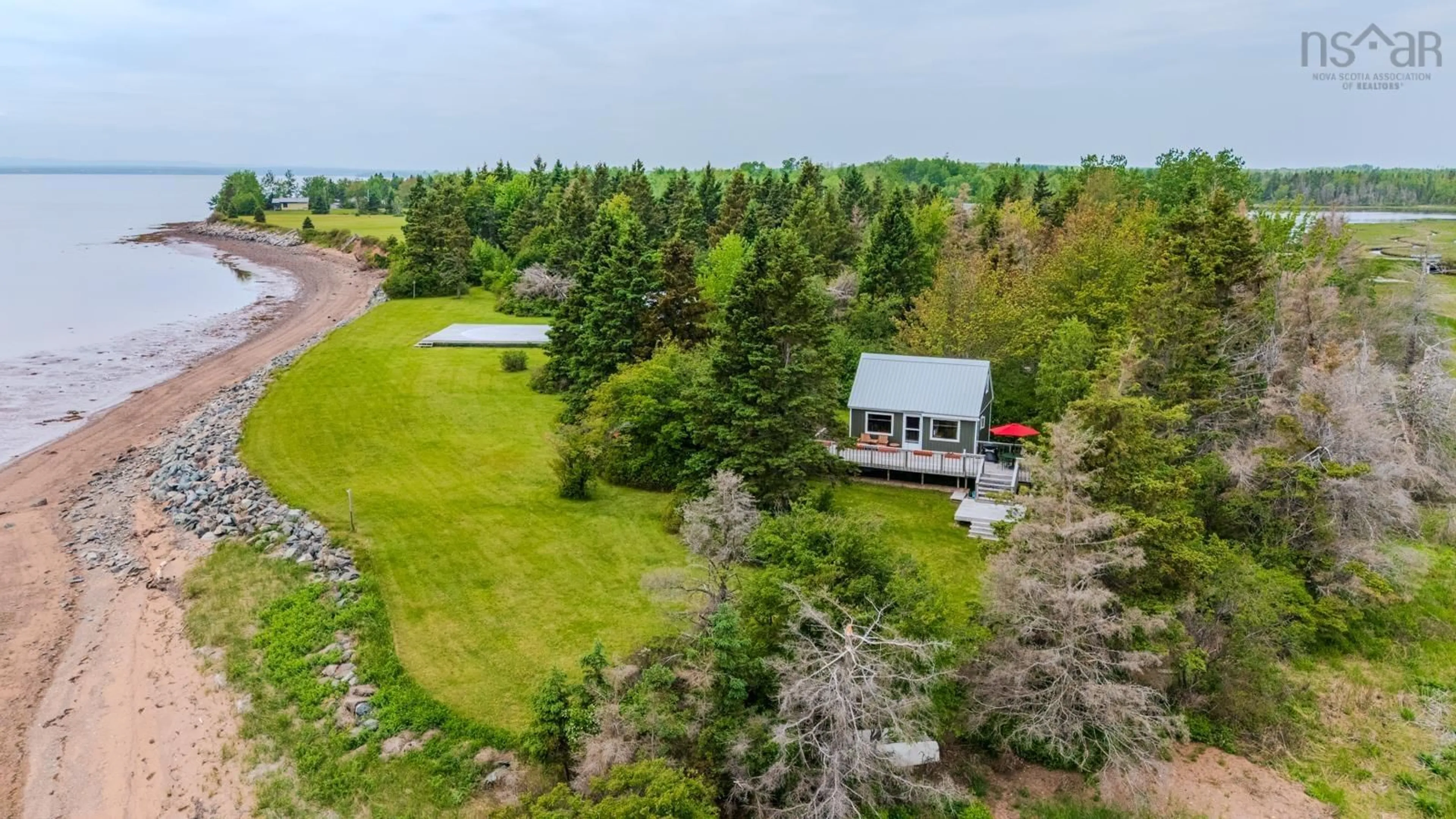 A pic from outside/outdoor area/front of a property/back of a property/a pic from drone, water/lake/river/ocean view for 4016 Malagash Rd, Malagash Point Nova Scotia B0K 1E0
