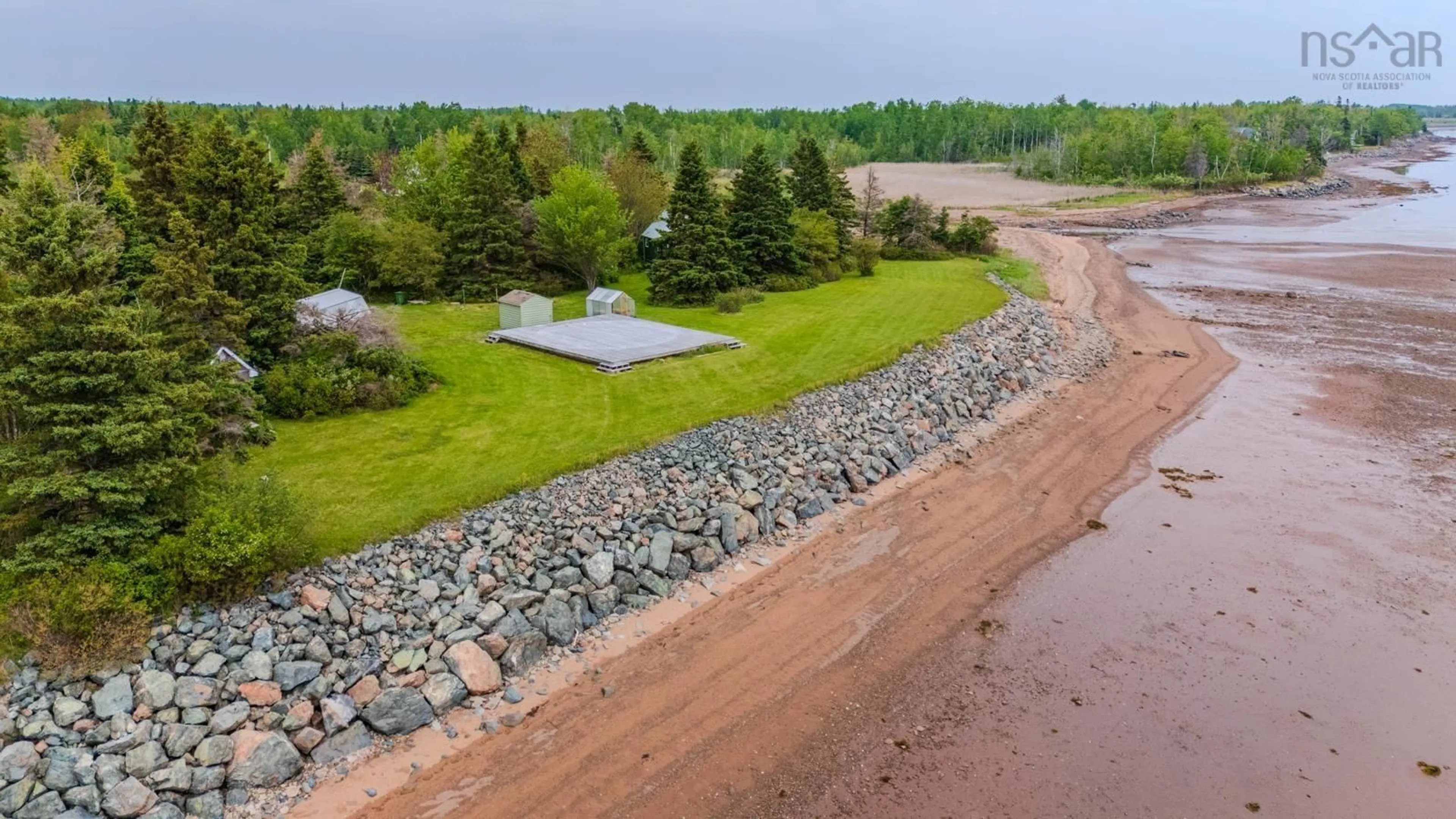 A pic from outside/outdoor area/front of a property/back of a property/a pic from drone, water/lake/river/ocean view for 4016 Malagash Rd, Malagash Point Nova Scotia B0K 1E0