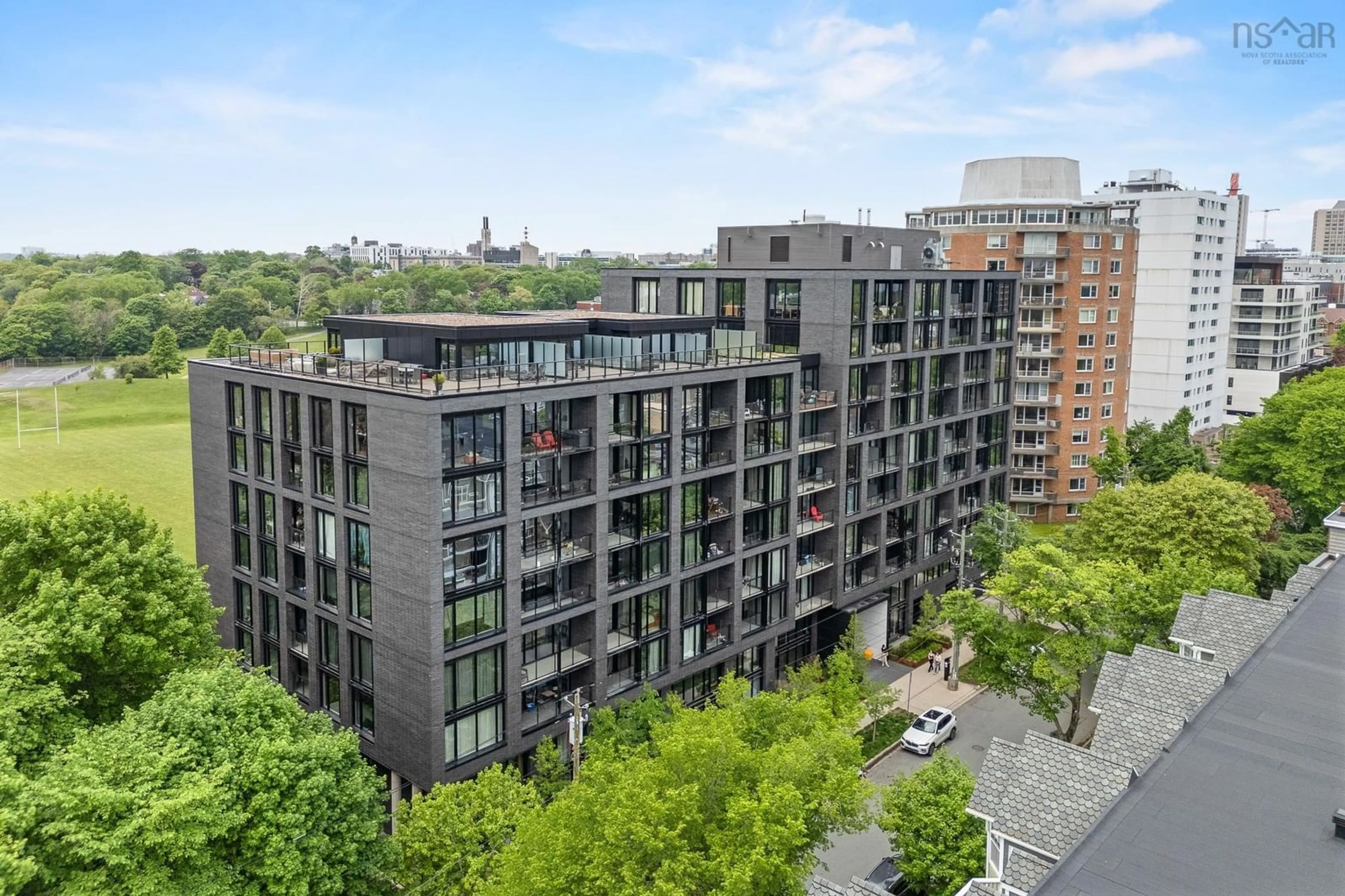 A pic from outside/outdoor area/front of a property/back of a property/a pic from drone, city buildings view from balcony for 1048 Wellington St #TH07, Halifax Nova Scotia B3H 0C2