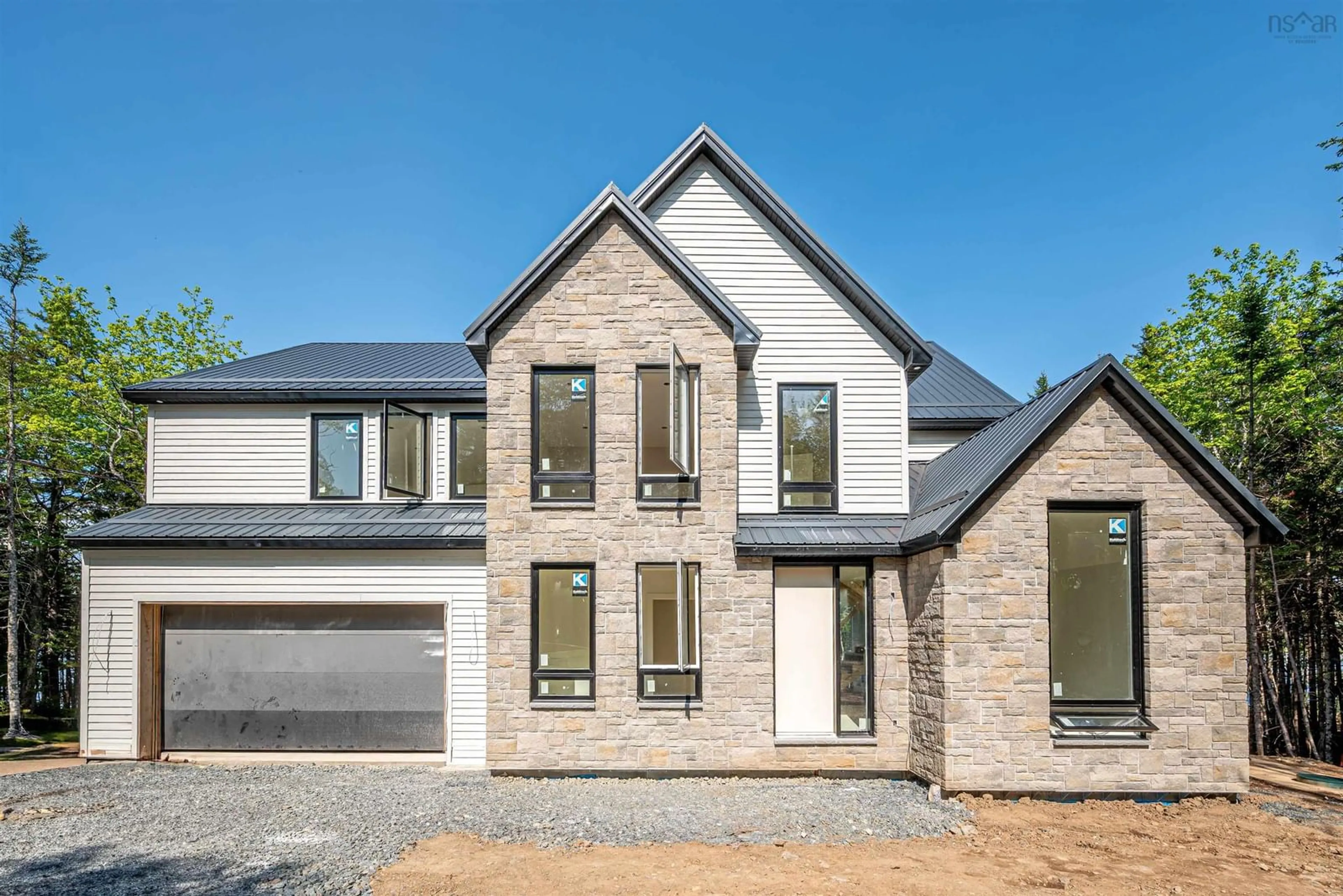 Home with brick exterior material, street for 103 Canoe Cres, Hammonds Plains Nova Scotia B4B 2P6