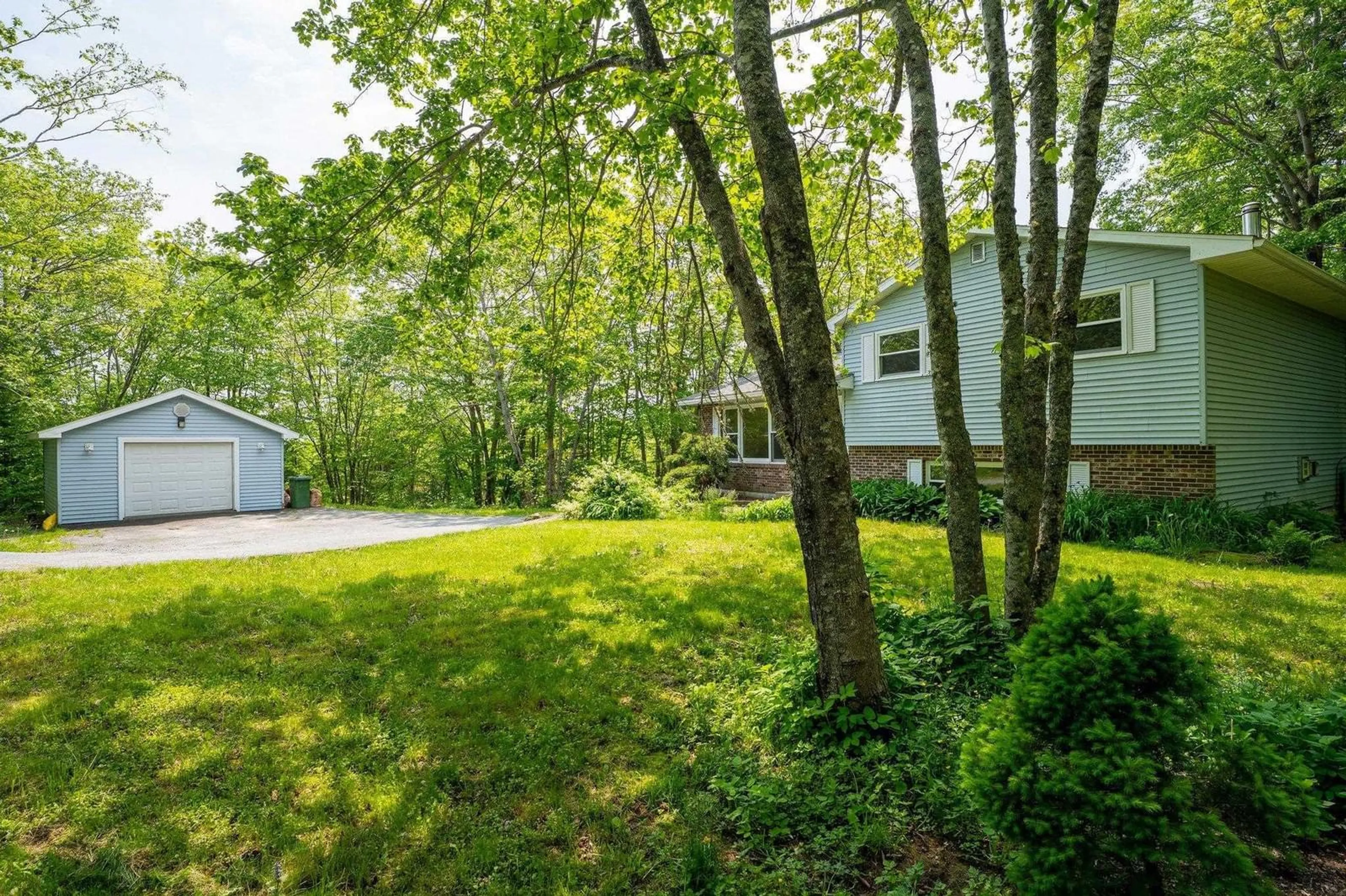 A pic from outside/outdoor area/front of a property/back of a property/a pic from drone, forest/trees view for 13 Greenhill Rd, Hammonds Plains Nova Scotia B3Z 1J6