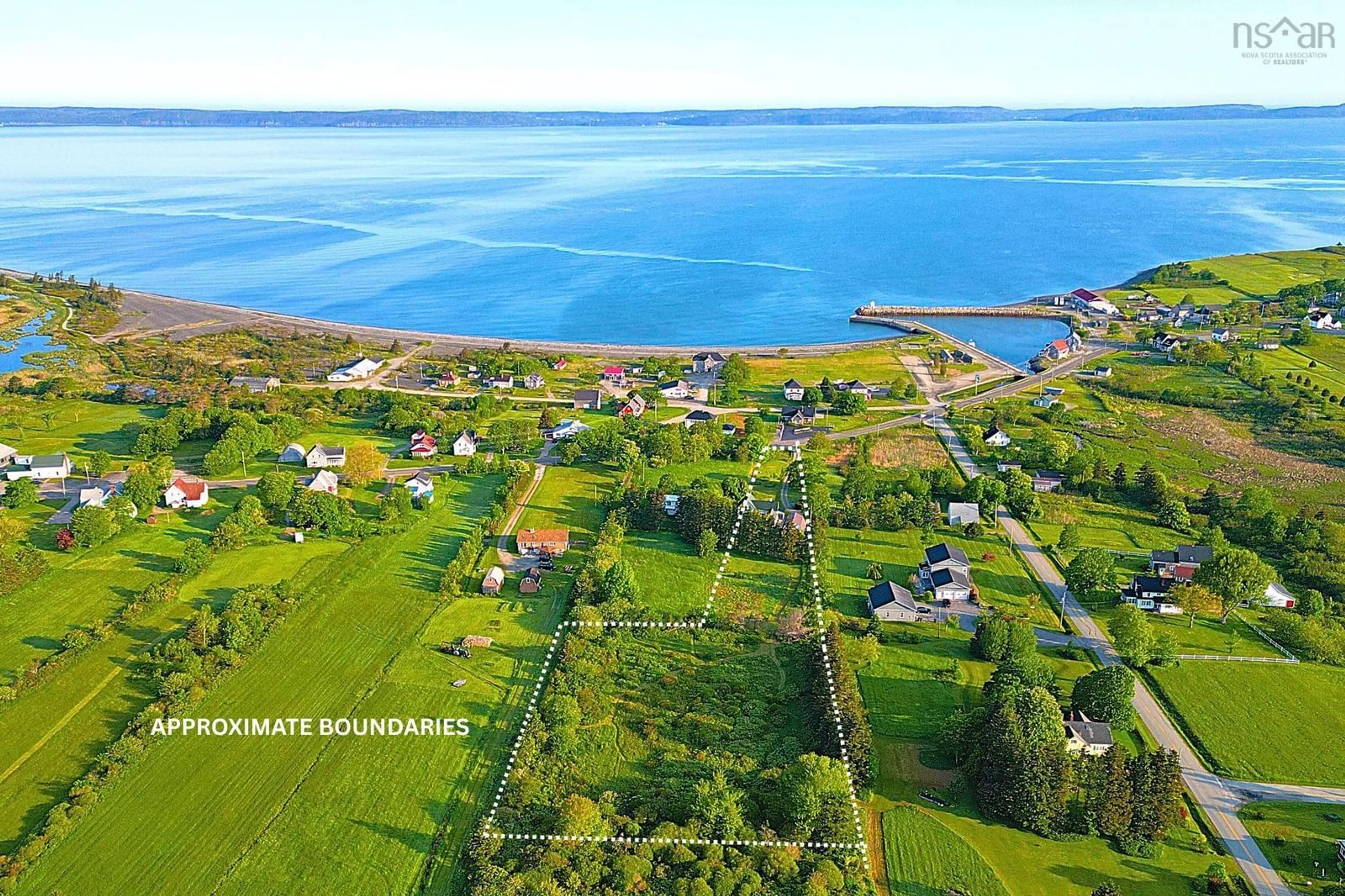 A pic from outside/outdoor area/front of a property/back of a property/a pic from drone, water/lake/river/ocean view for 3208 Highway 1, Belliveaus Cove Nova Scotia B0W 1J0