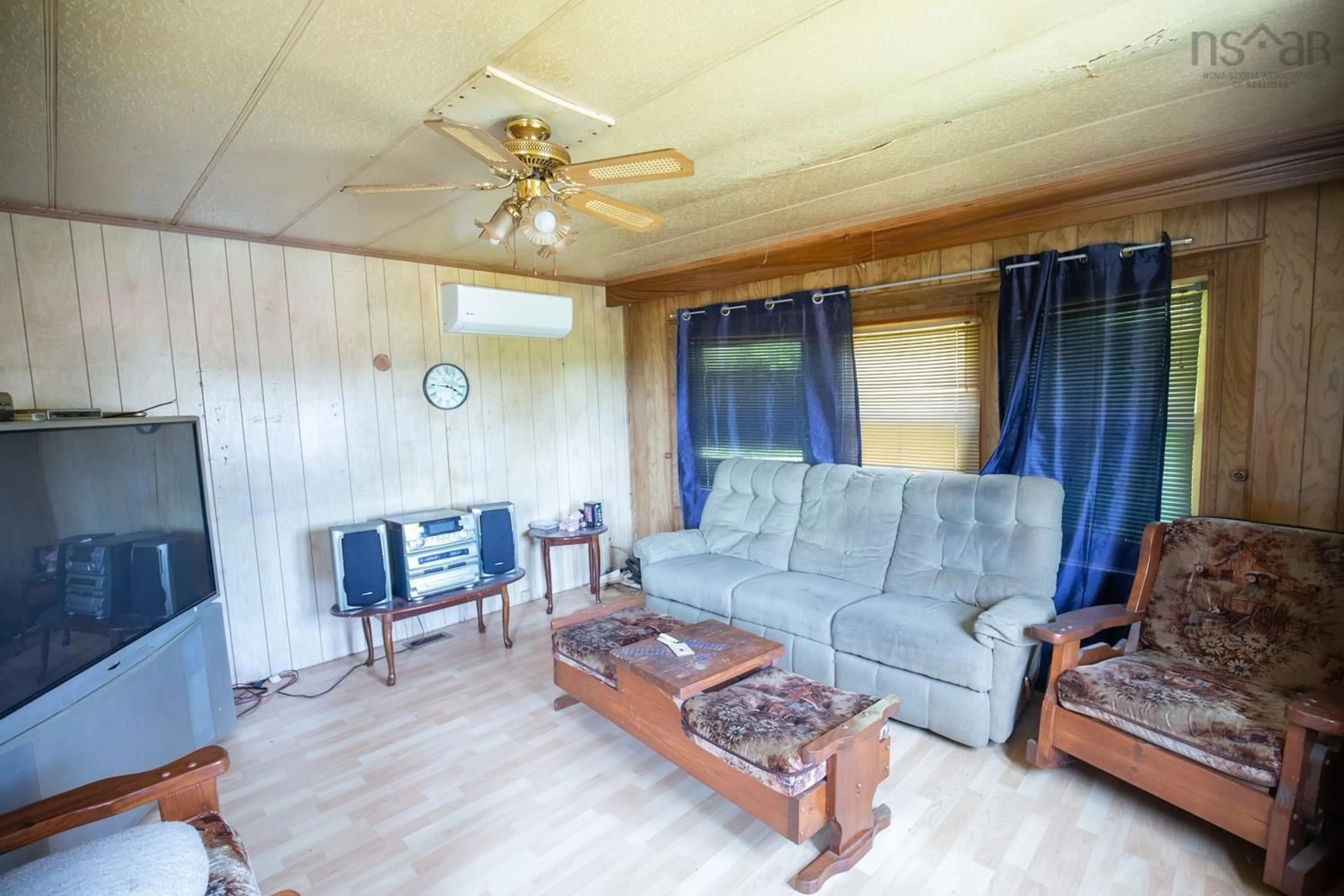 Living room with furniture, wood/laminate floor for 34 Bergman Lane, Mount Thom Nova Scotia B0K 1P0