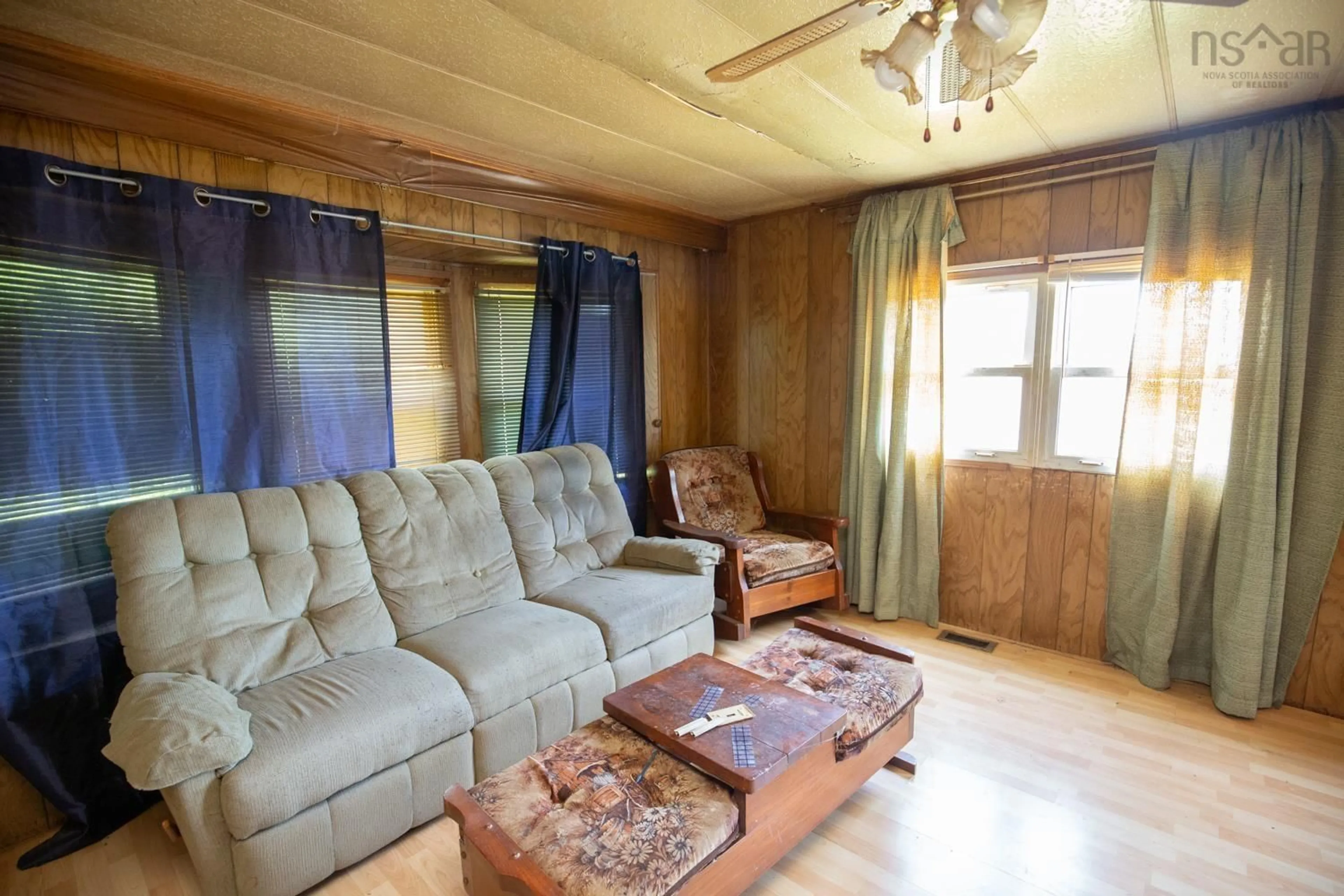 Living room with furniture, wood/laminate floor for 34 Bergman Lane, Mount Thom Nova Scotia B0K 1P0