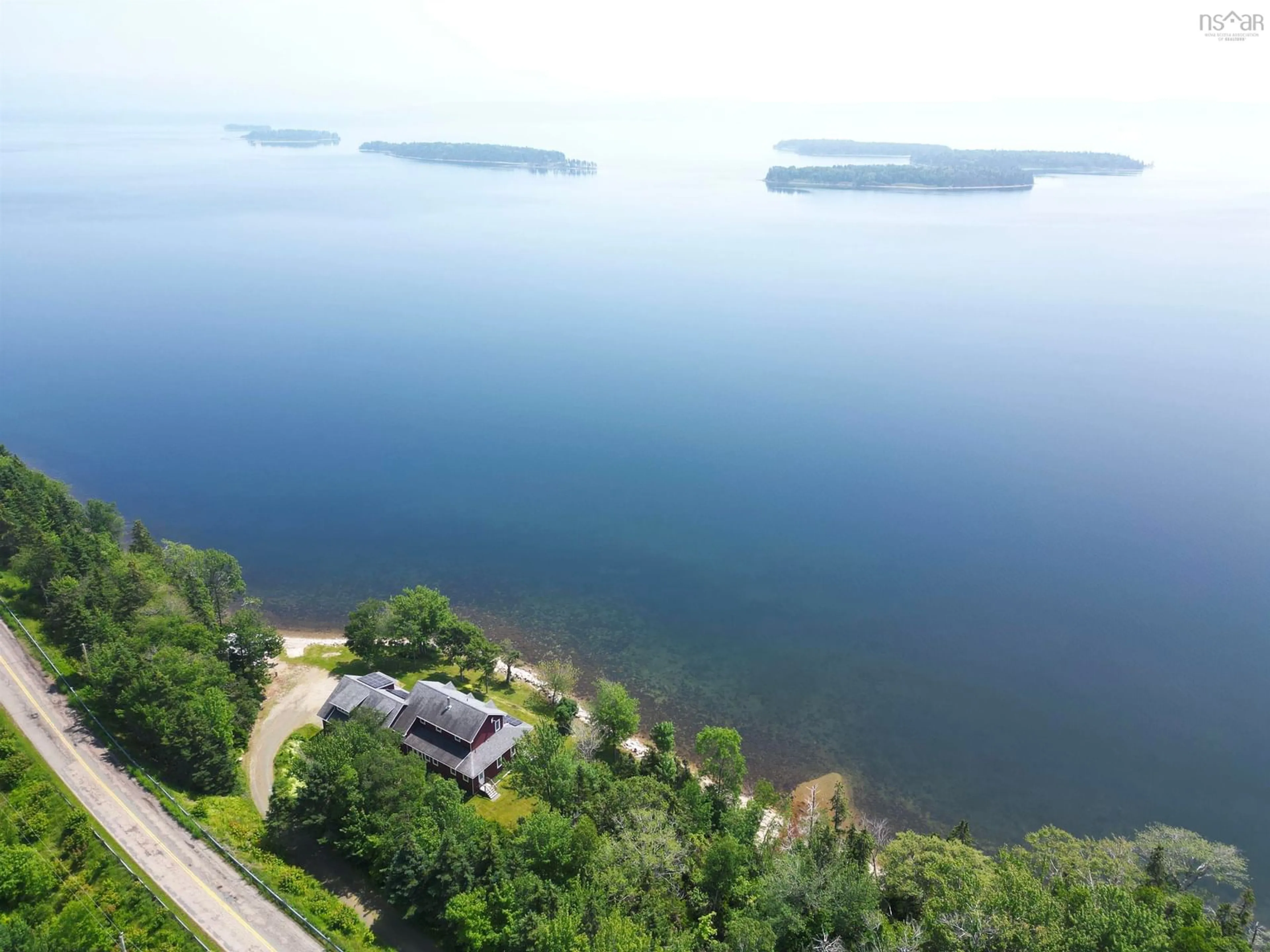 A pic from outside/outdoor area/front of a property/back of a property/a pic from drone, water/lake/river/ocean view for 5276 Marble Mountain Rd, Marble Mountain Nova Scotia B0E 3K0