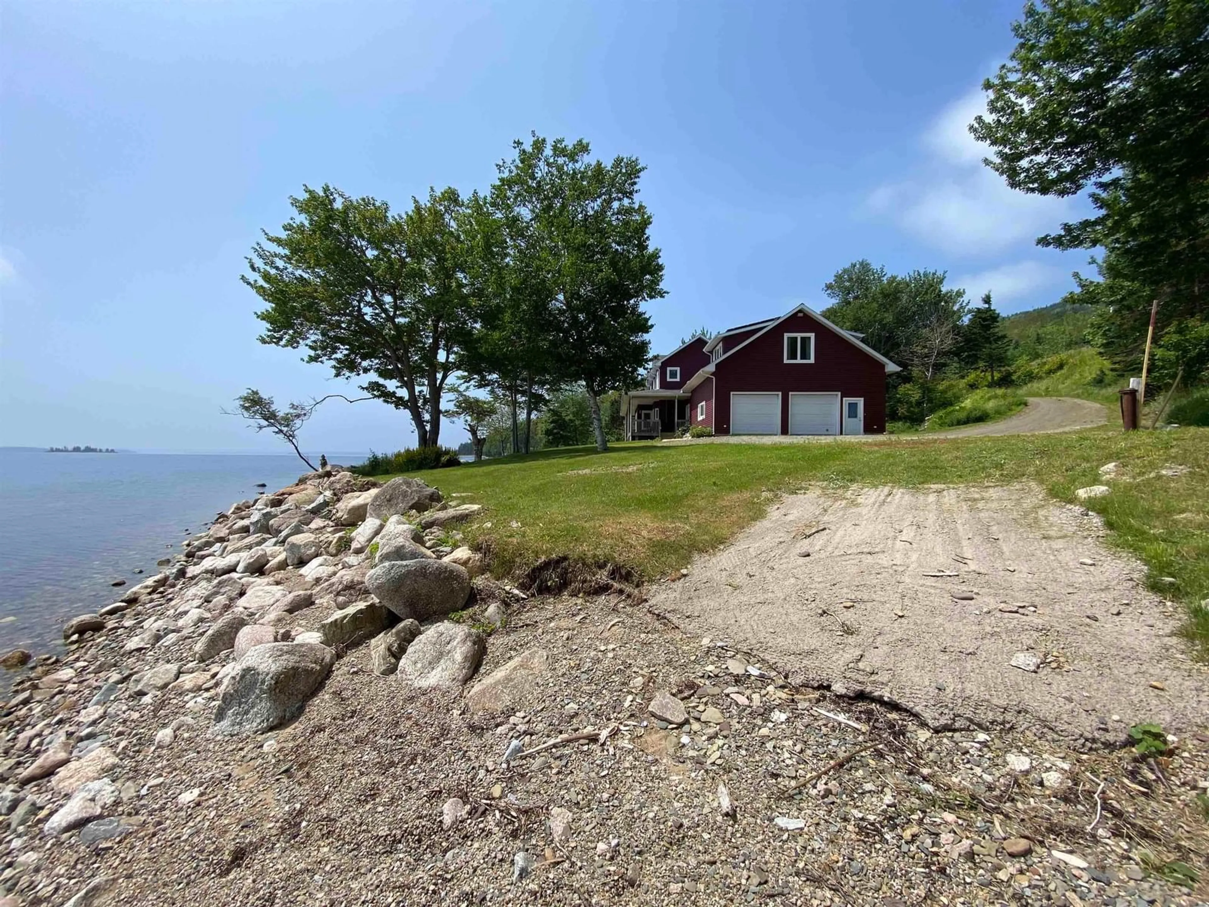 A pic from outside/outdoor area/front of a property/back of a property/a pic from drone, water/lake/river/ocean view for 5276 Marble Mountain Rd, Marble Mountain Nova Scotia B0E 3K0