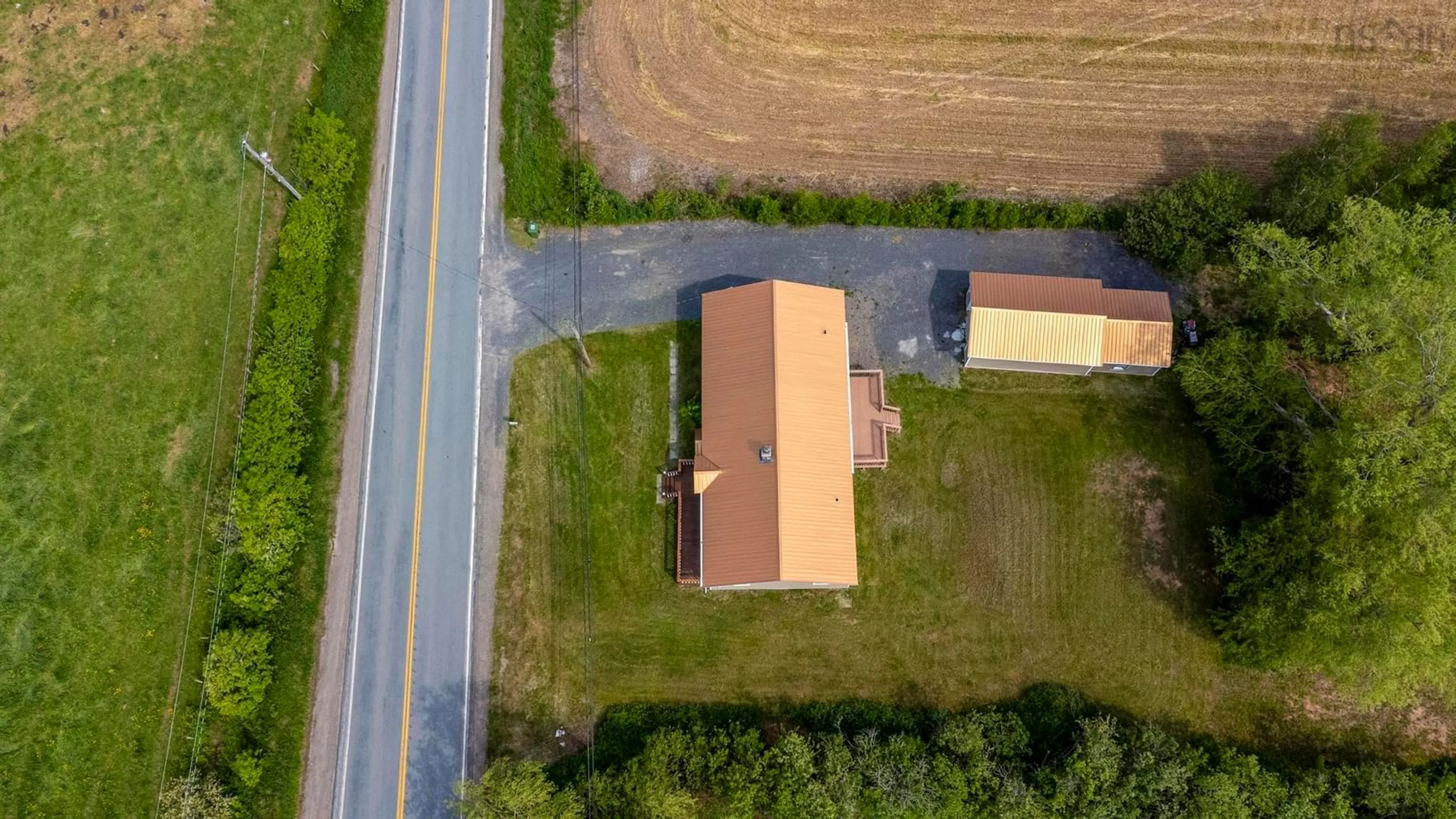 A pic from outside/outdoor area/front of a property/back of a property/a pic from drone, building for 1468 Victoria Road, Dempseys Corner Nova Scotia B0P 1C0