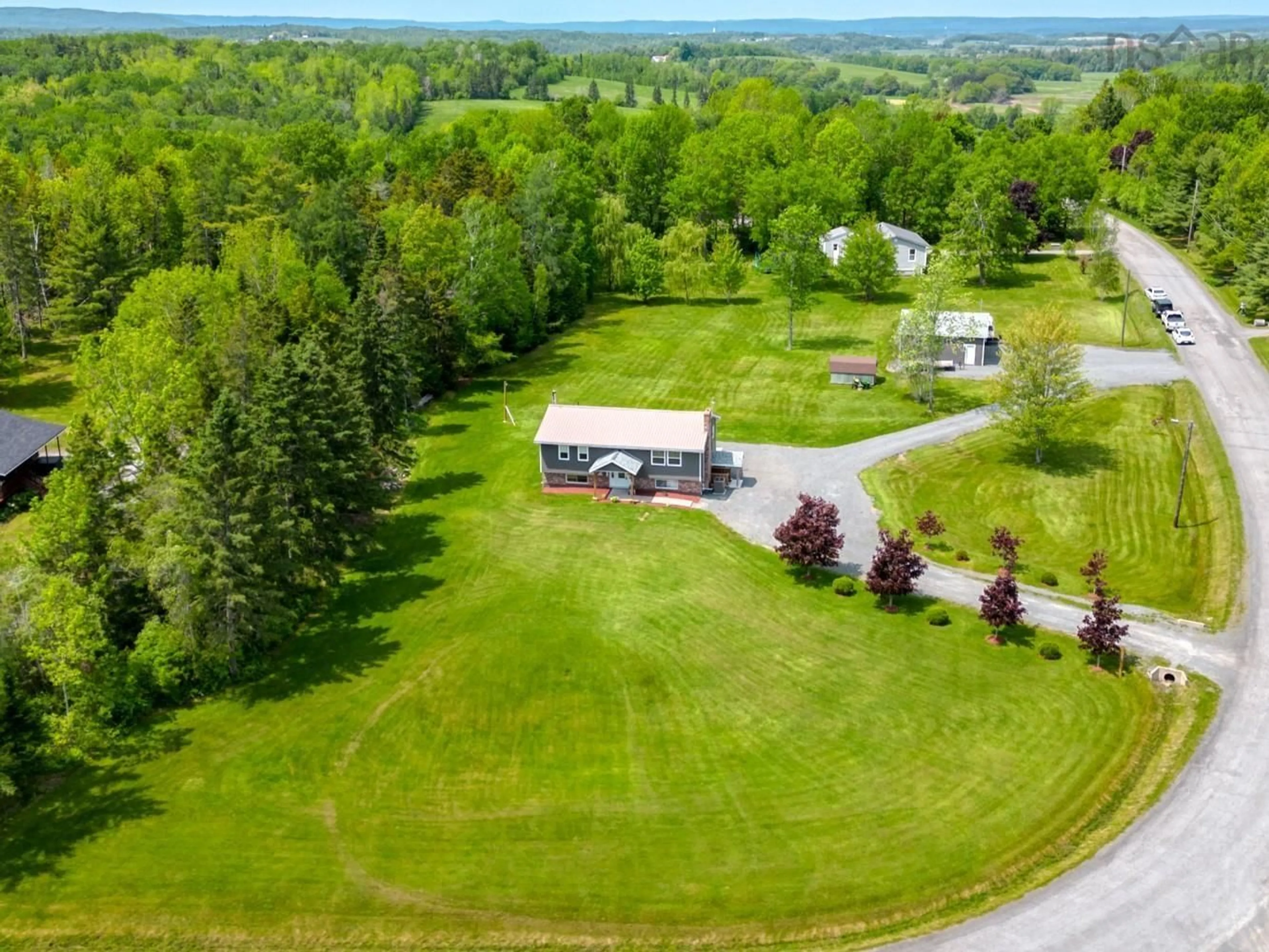 A pic from outside/outdoor area/front of a property/back of a property/a pic from drone, mountain view for 91 Lakewood Dr, Brooklyn Nova Scotia B0N 2A0
