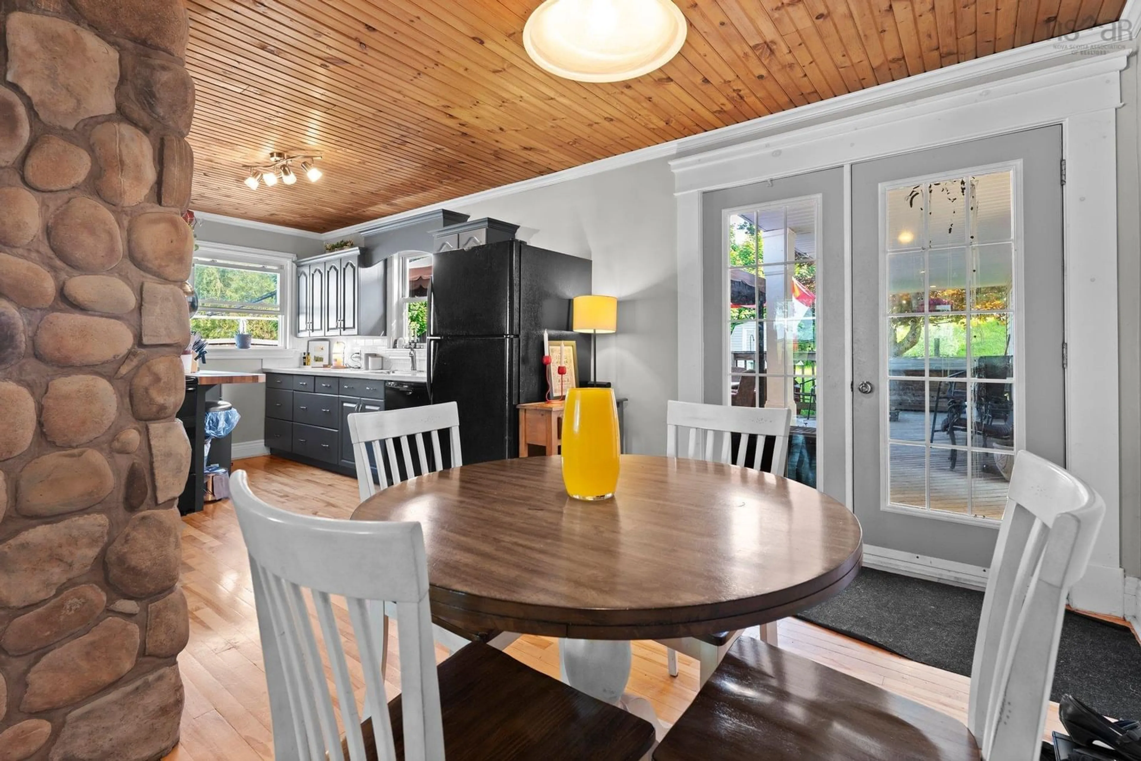 Open concept kitchen, wood/laminate floor for 11 Maple Ave, Hantsport Nova Scotia B0P 1P0