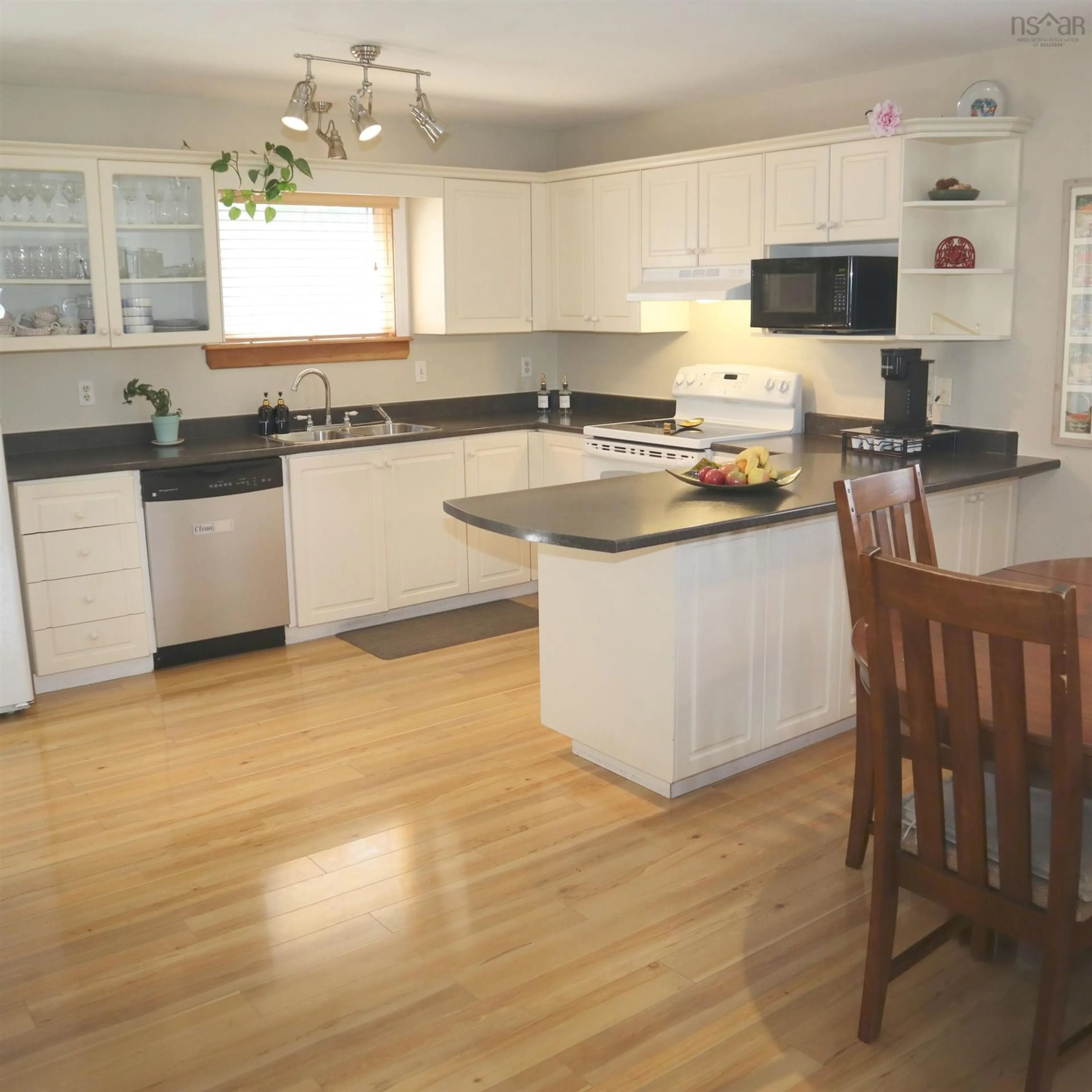 Open concept kitchen, wood/laminate floor for 133 Silistria Dr, Dartmouth Nova Scotia B2W 6A7