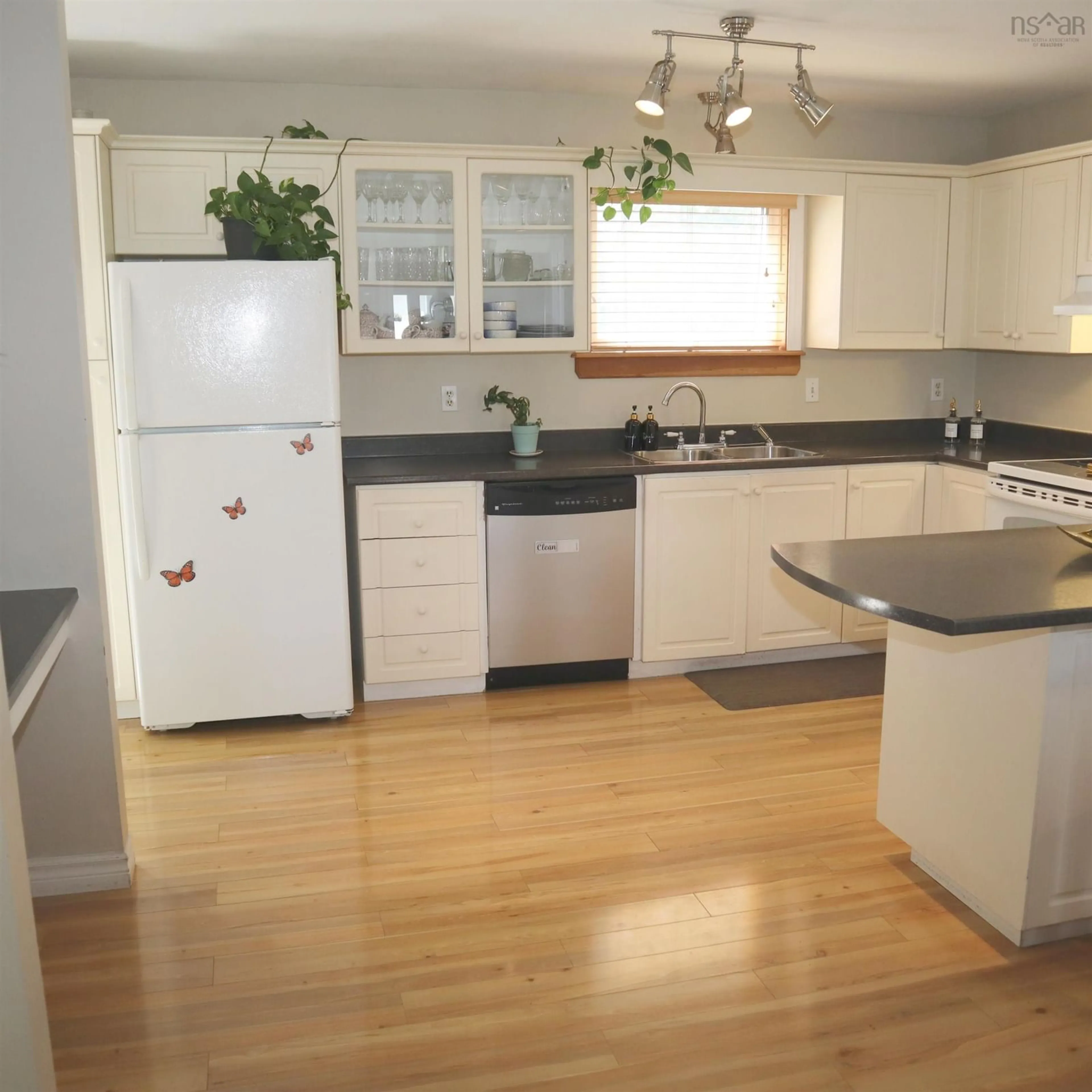 Open concept kitchen, wood/laminate floor for 133 Silistria Dr, Dartmouth Nova Scotia B2W 6A7