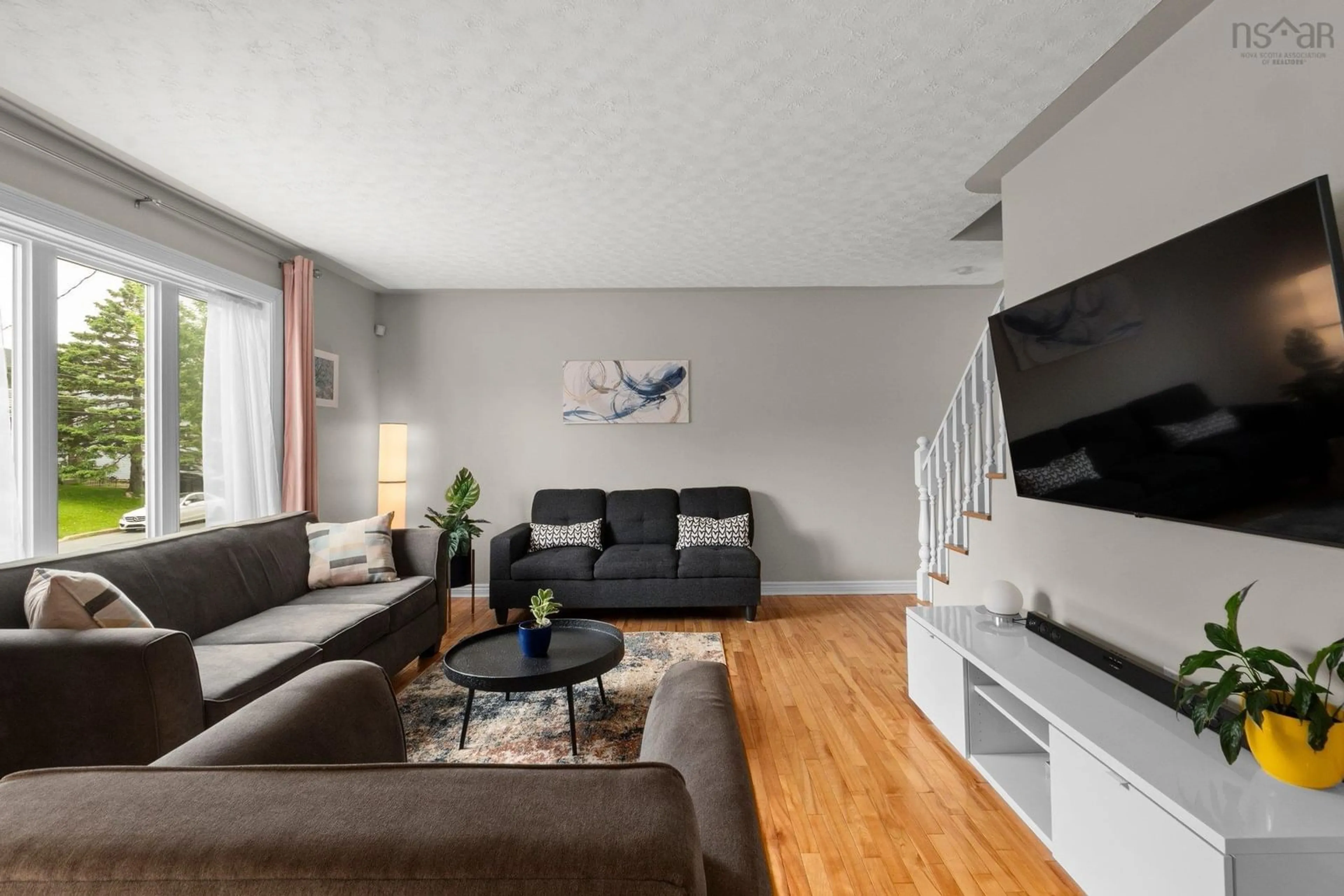 Living room with furniture, wood/laminate floor for 14 Ancona Pl, Dartmouth Nova Scotia B2X 3K8