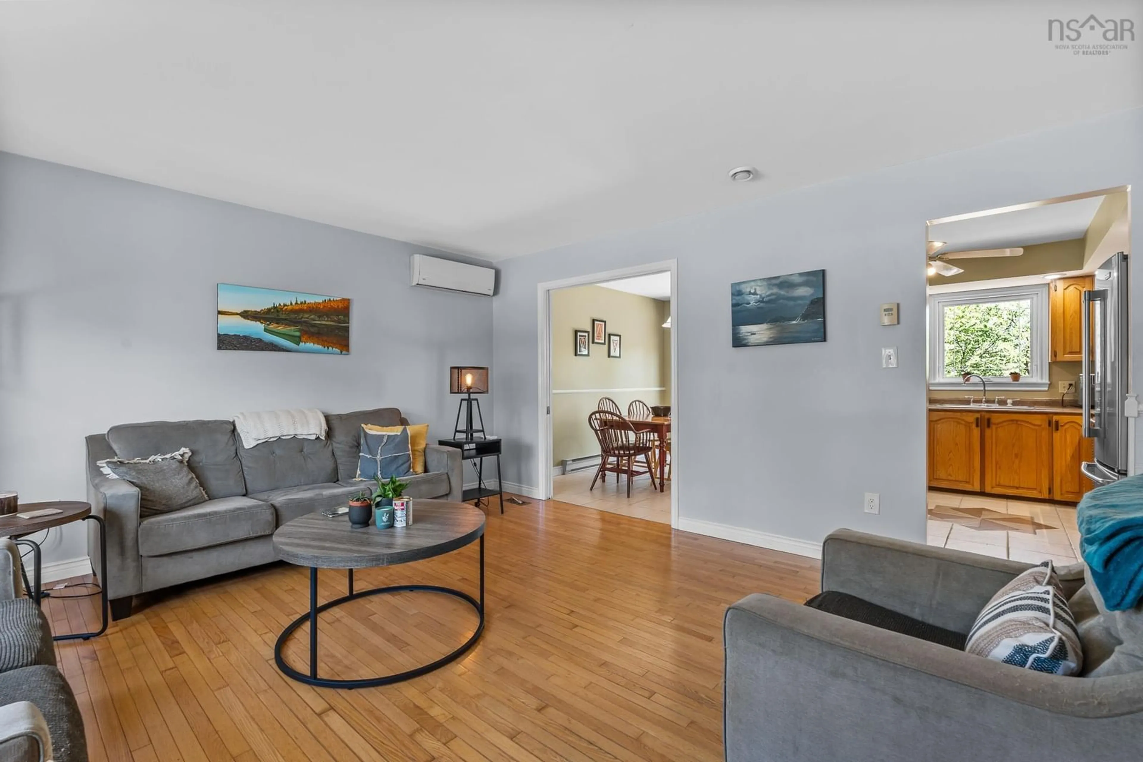 Living room with furniture, wood/laminate floor for 108 Lumberman Dr, Middle Sackville Nova Scotia B4E 2W1