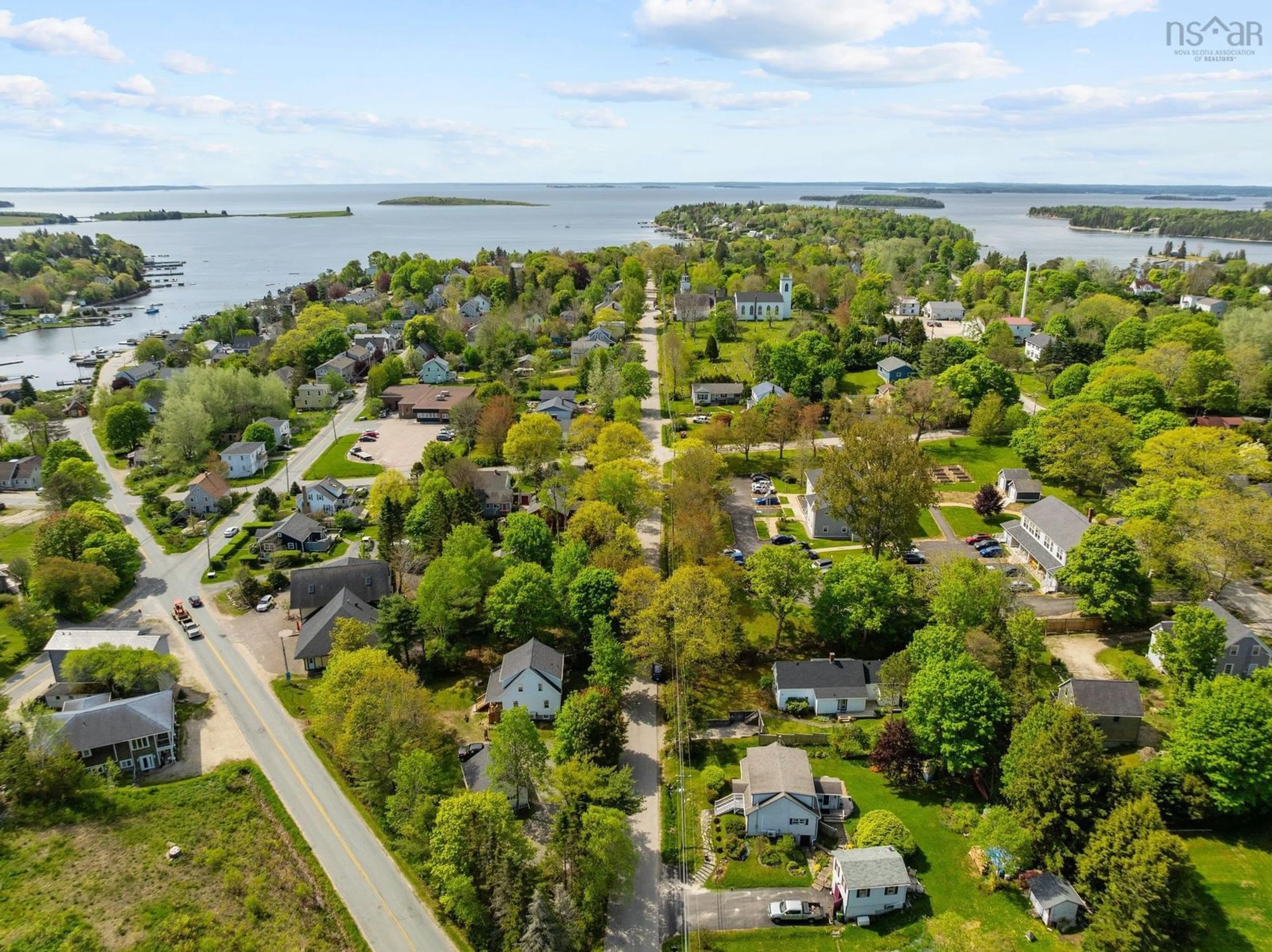 A pic from outside/outdoor area/front of a property/back of a property/a pic from drone, water/lake/river/ocean view for 165 King St, Chester Nova Scotia B0J 1J0