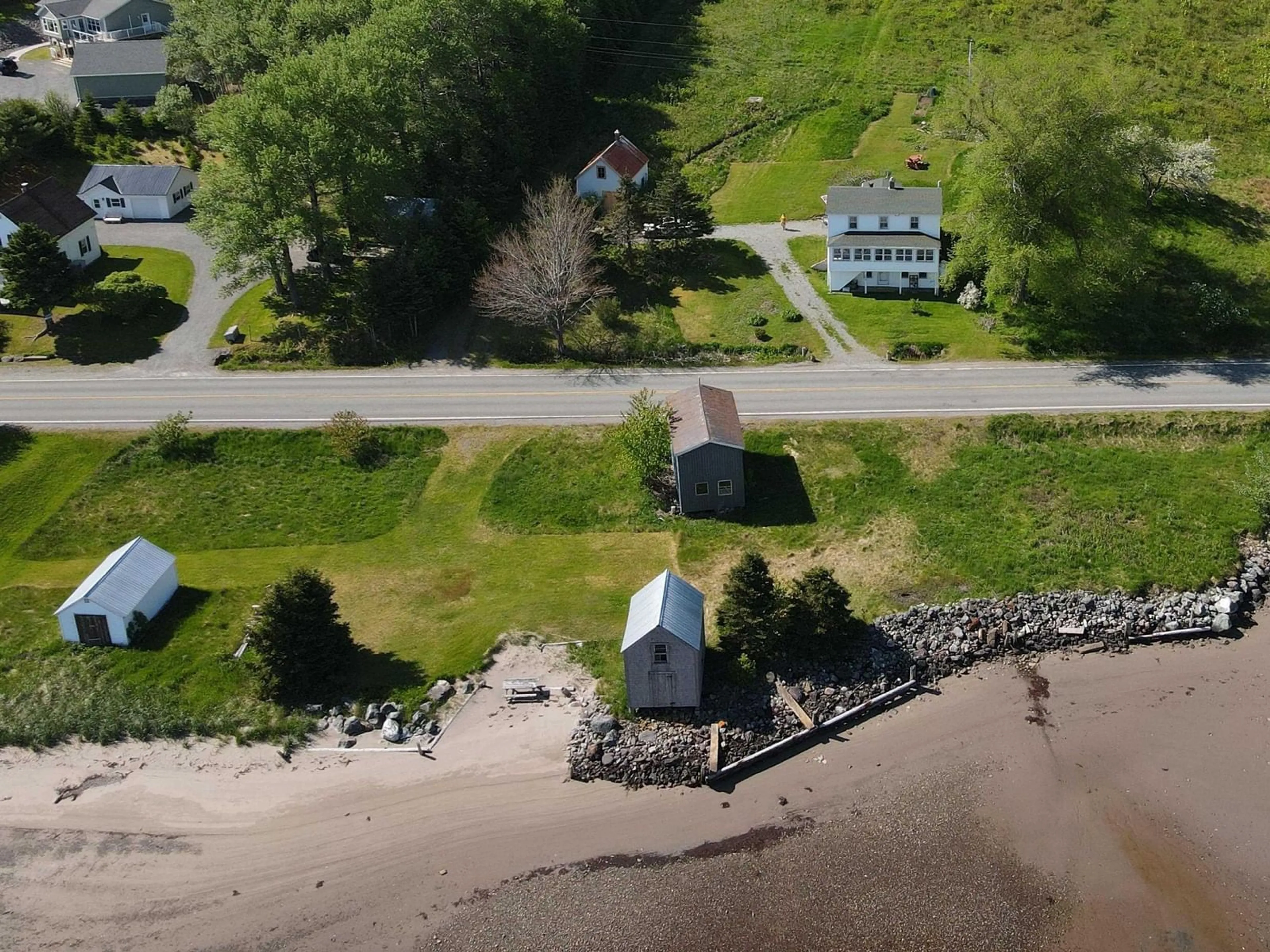 A pic from outside/outdoor area/front of a property/back of a property/a pic from drone, water/lake/river/ocean view for 9399 Ns-16, Cooks Cove Nova Scotia B0H 1N0