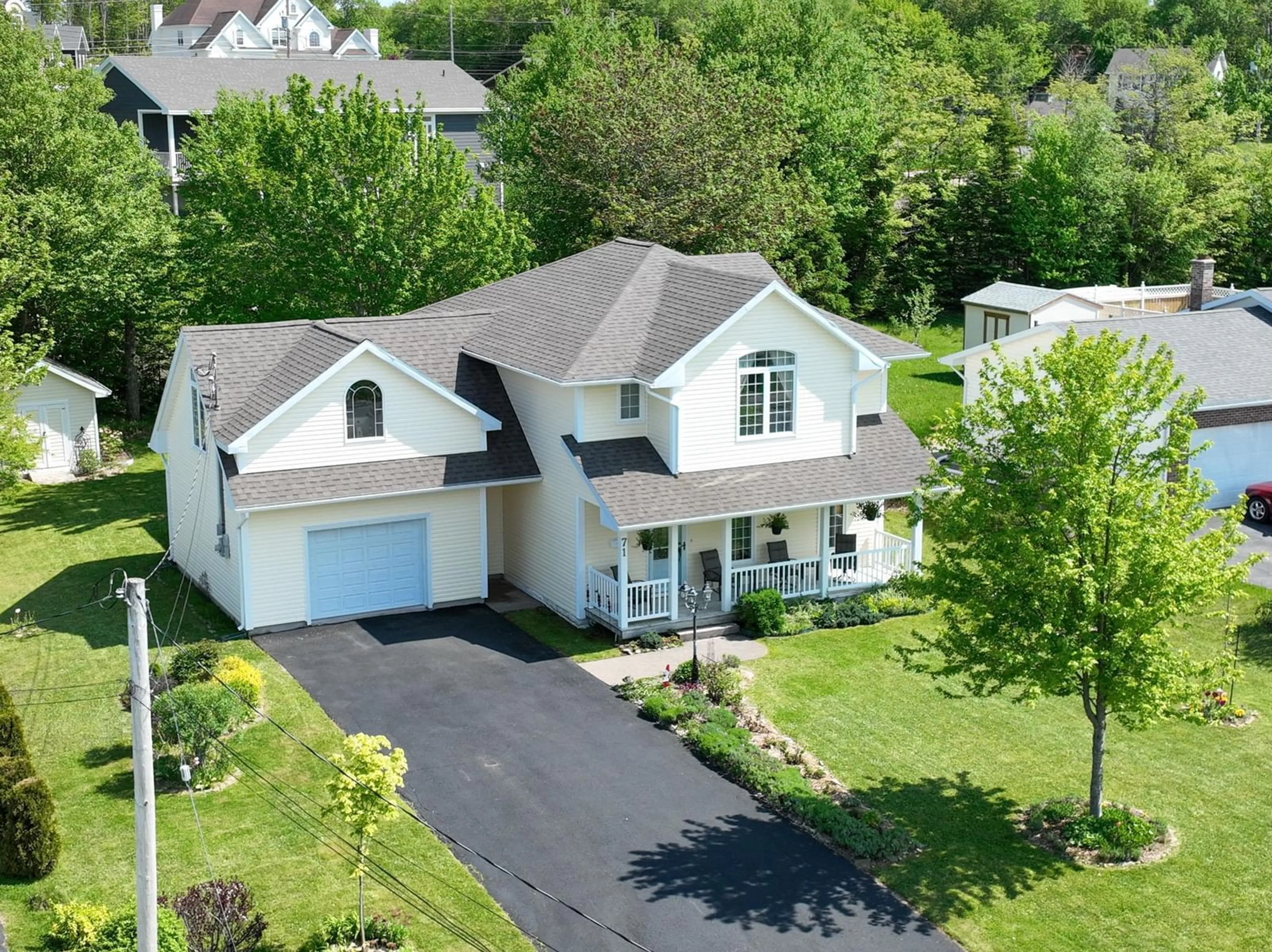 A pic from outside/outdoor area/front of a property/back of a property/a pic from drone, street for 71 Carmichael Dr, Sydney River Nova Scotia B1S 3J1